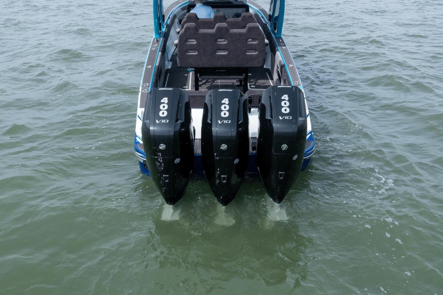 2024 Statement 38 Open boat with triple Mercury 400 V10 engines on water.
