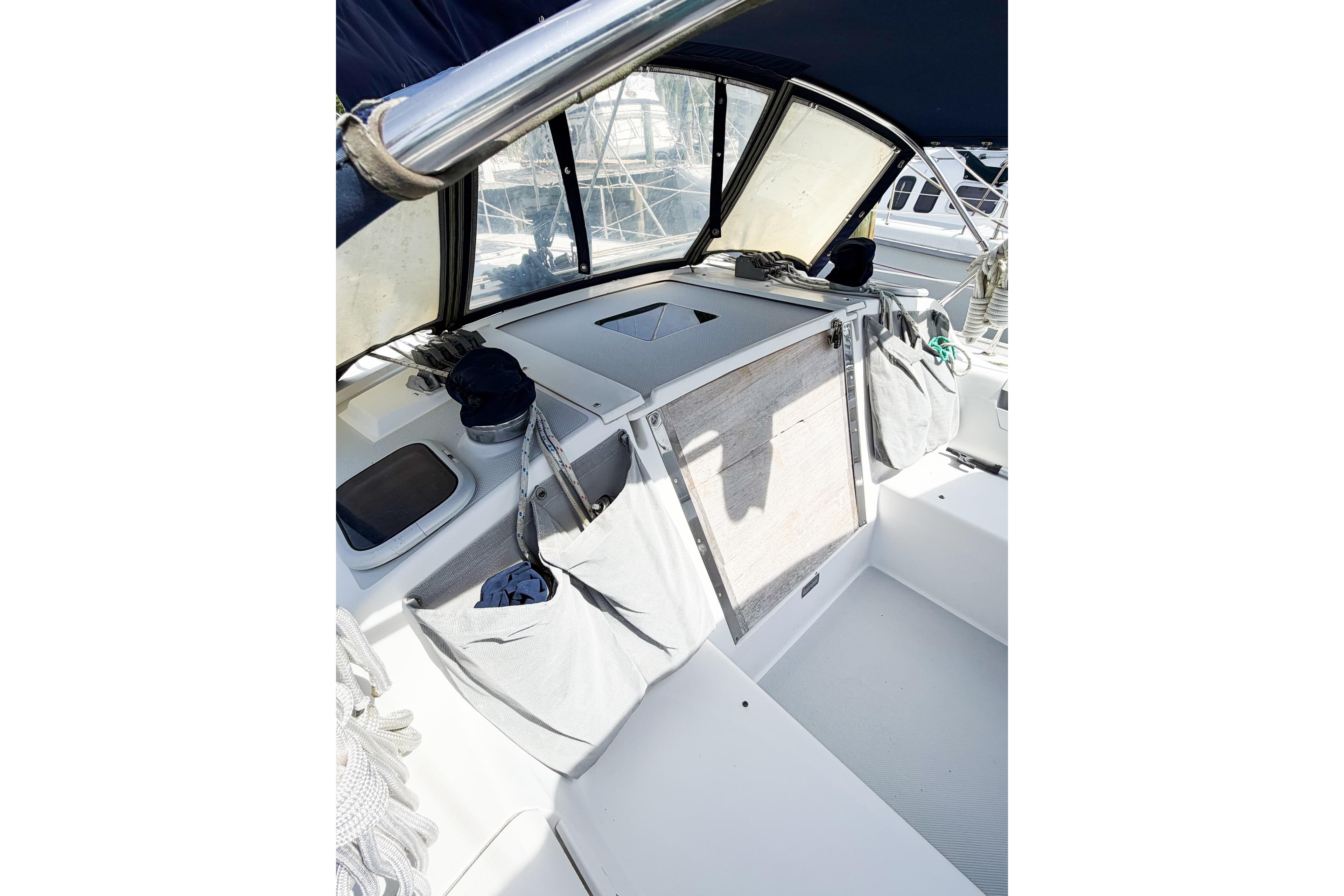 Cockpit of 2003 Catalina 34 MkII sailboat with storage compartments and seating.