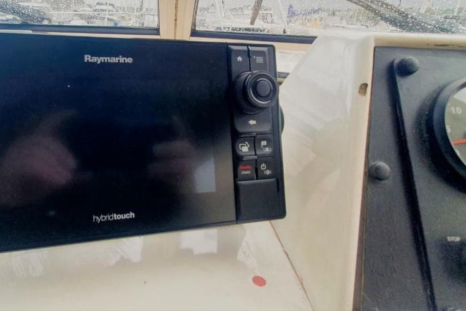 Raymarine HybridTouch display on 1989 Princess 35 boat dashboard.