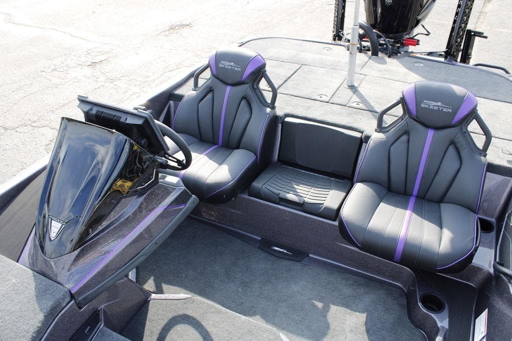2026 Skeeter ZXE21 boat interior with dual black and purple seats.
