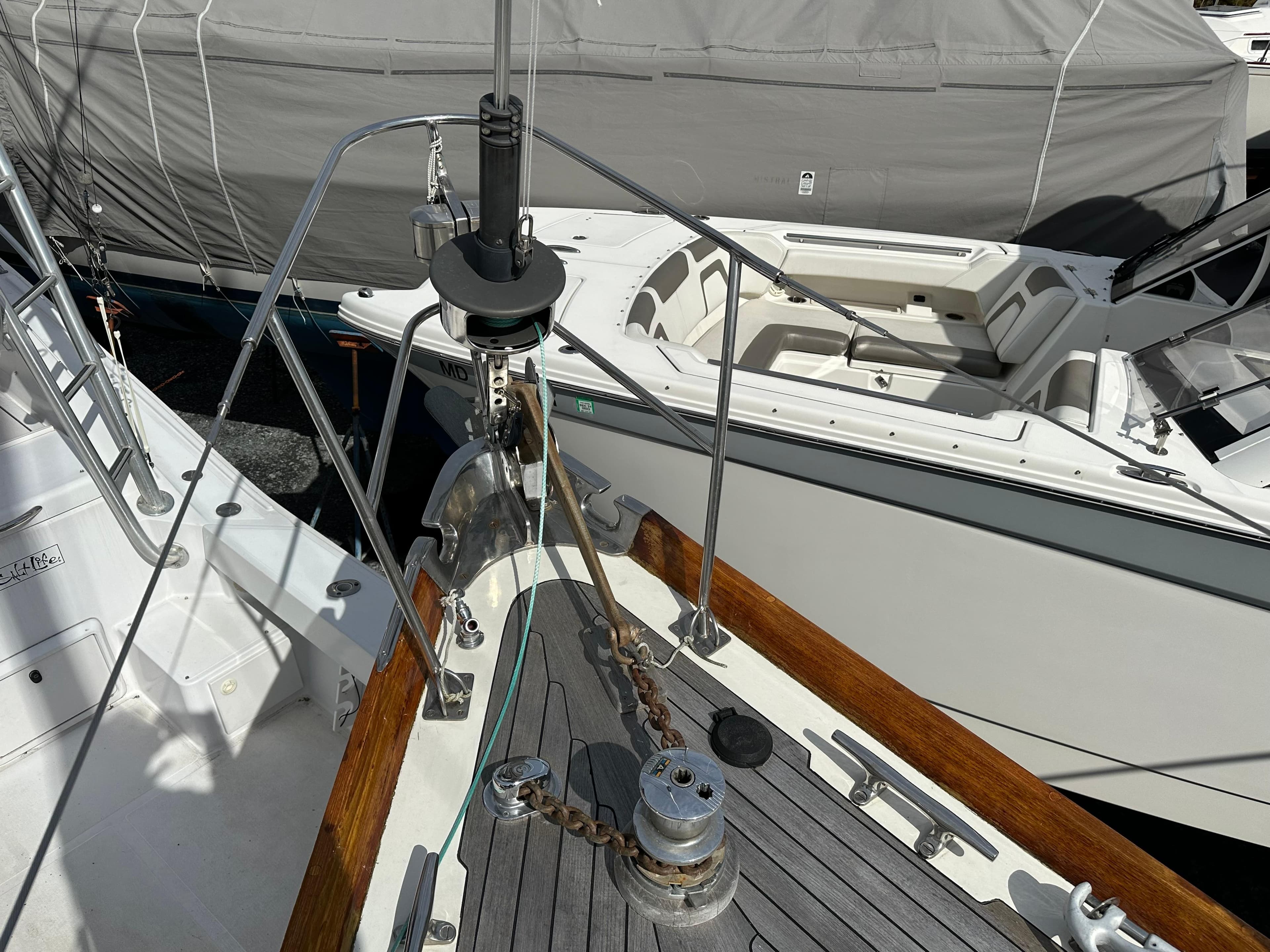 Bow of 1978 Hinckley Bermuda 40 MK III sailboat with anchor and winch.