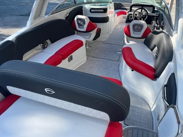 2024 Crownline 290 SS boat interior with red, black, and white seating.