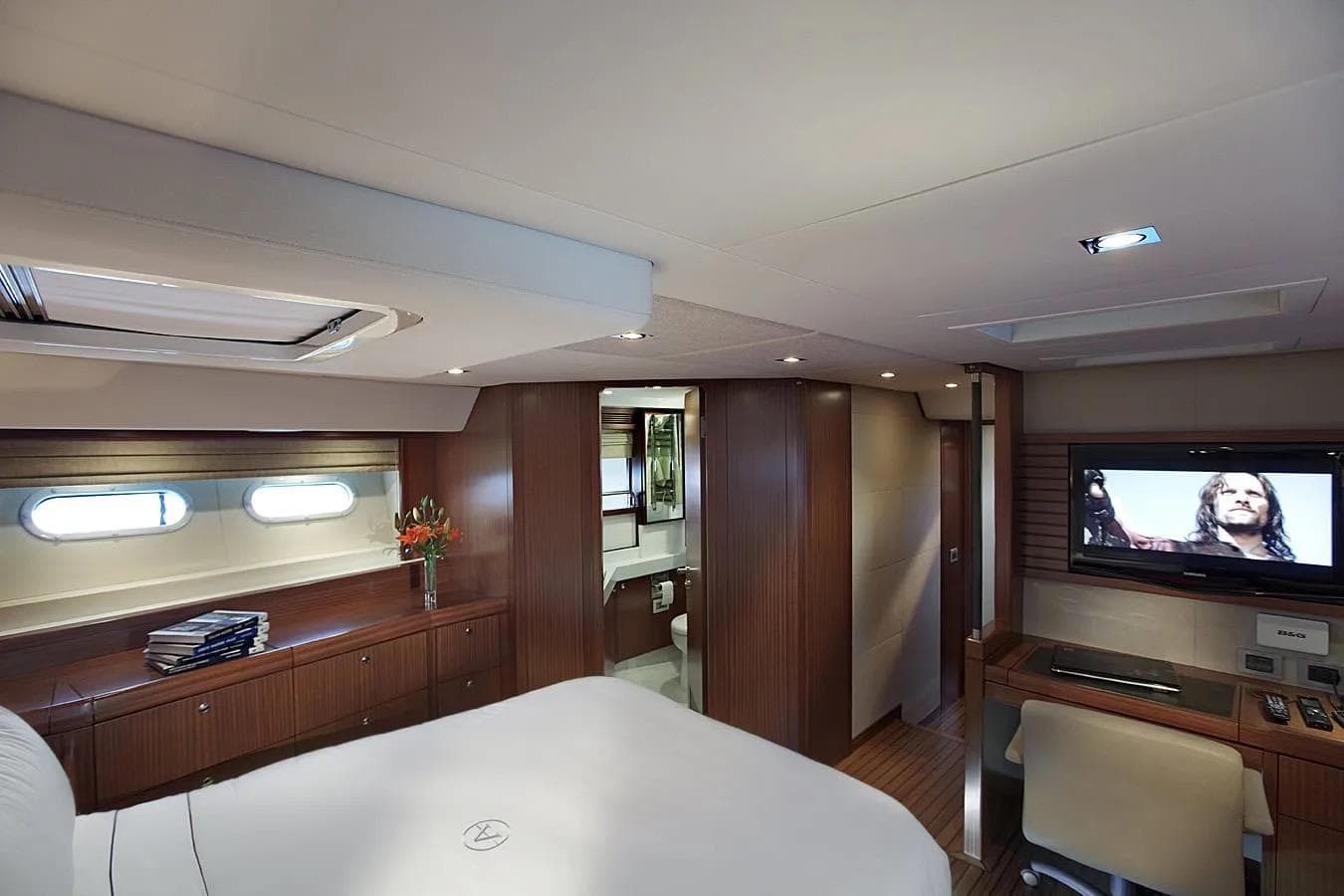 Luxurious 2010 Alia Yachts AIYANA cabin with modern amenities and elegant wood finishes.