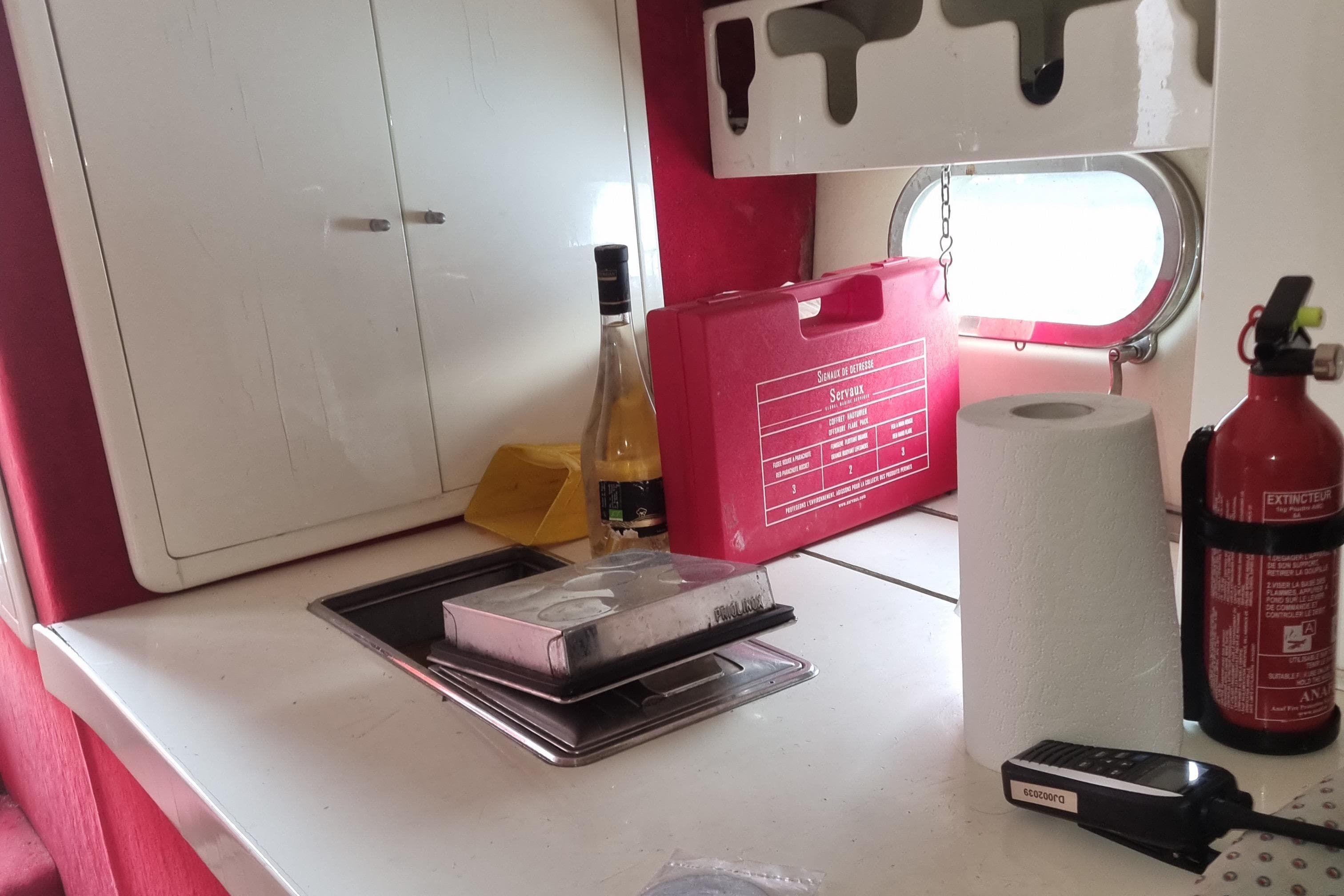 Interior of 1991 Tullio Abbate Superiority 41 boat with kitchen essentials and safety equipment.