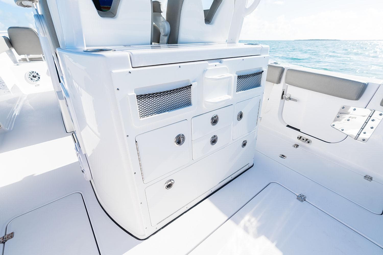 Manufacturer Provided Image: 2025 Sportsman Open 282 Center Console boat interior with storage compartments.