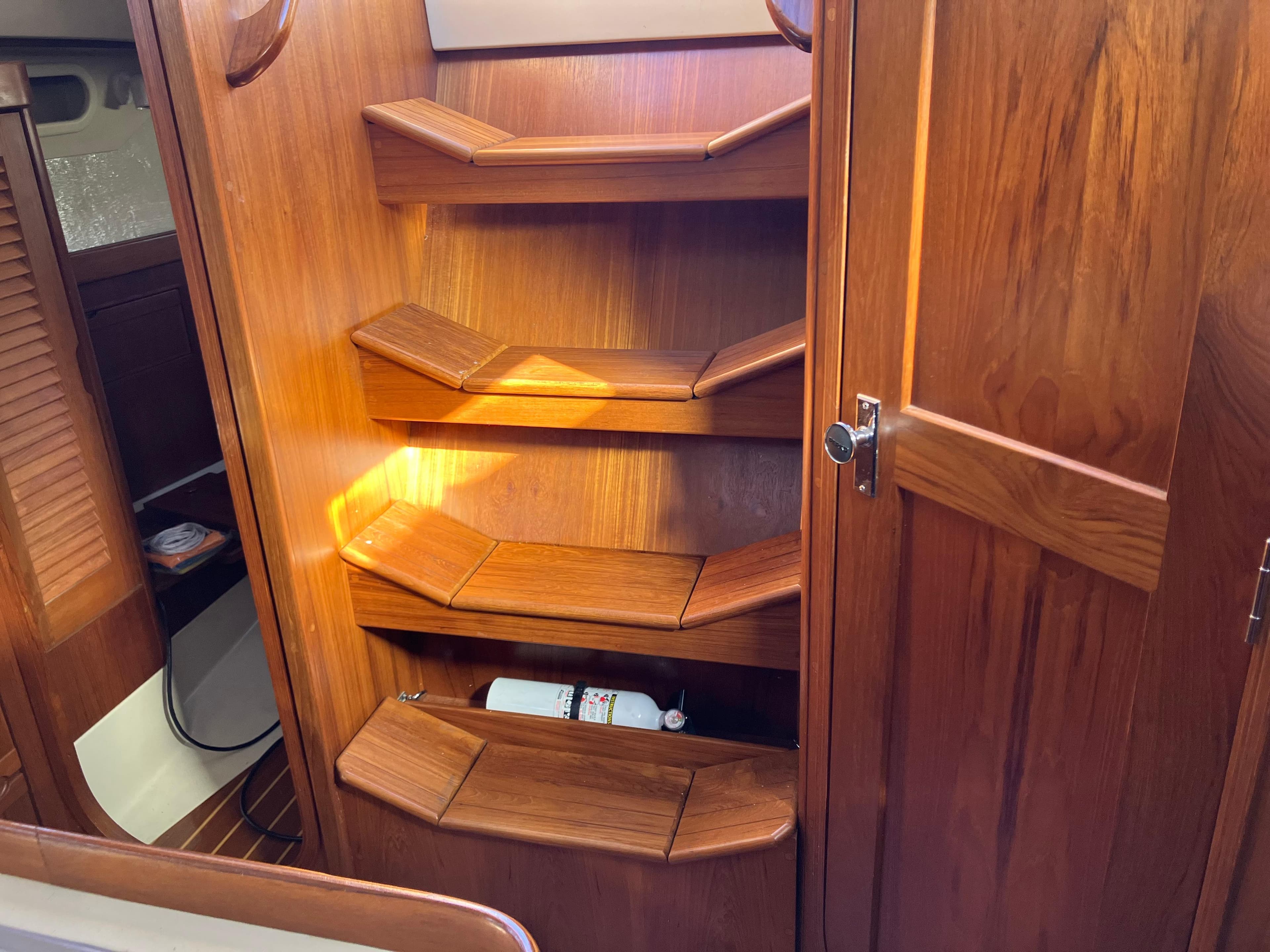 Wooden interior shelves on a 1989 Pearson 39-2 sailboat.
