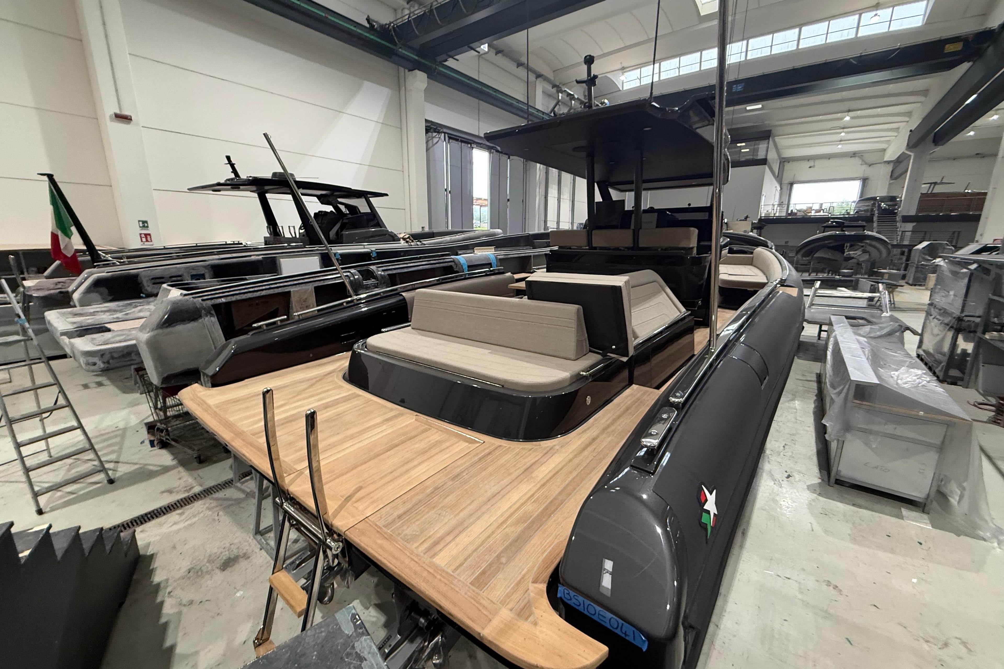 2026 Novamarine Black Shiver 100 Diesel yacht in a spacious indoor facility.