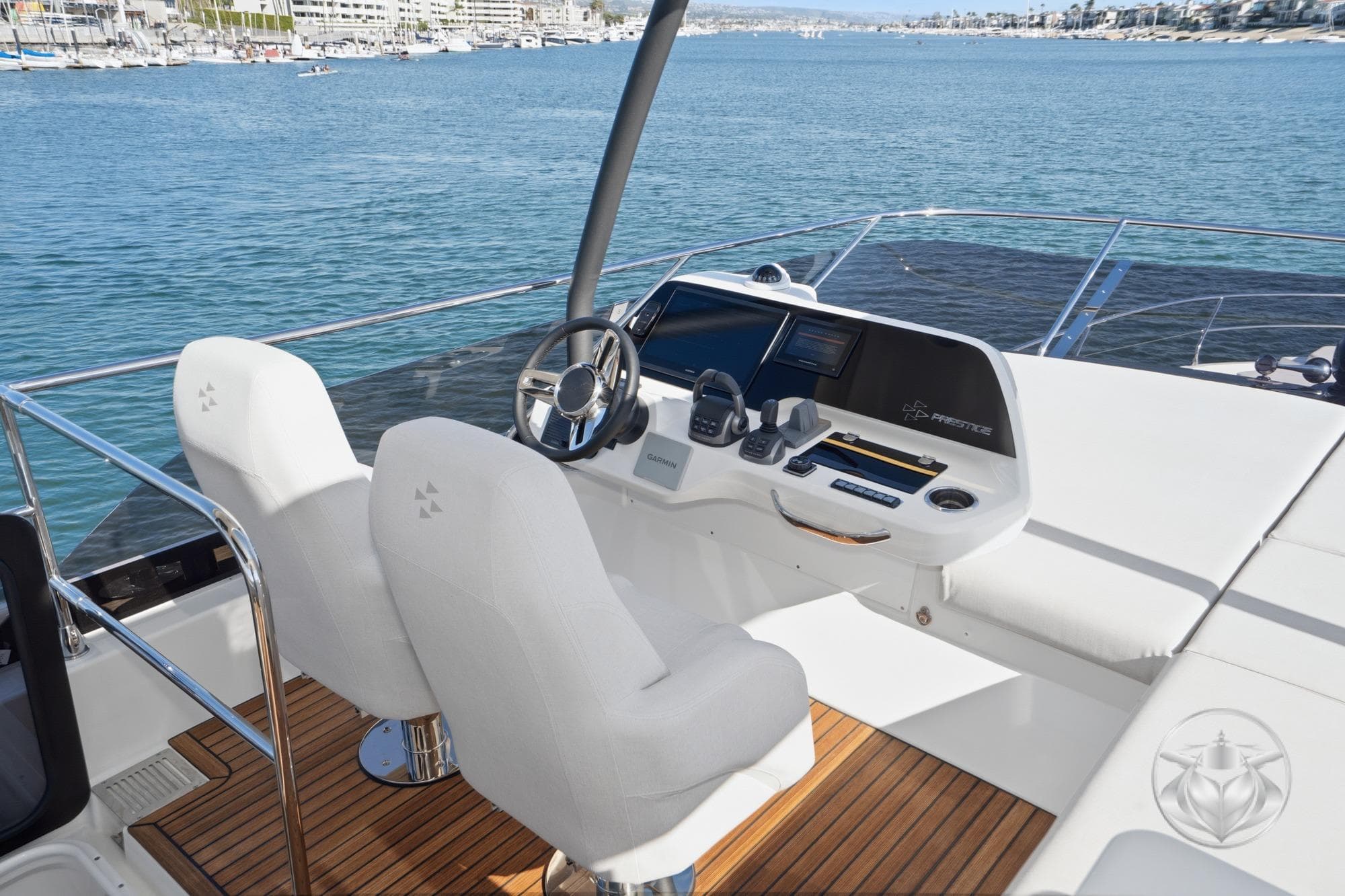Luxurious 2026 Prestige F5.7 yacht helm with modern controls and ocean view.