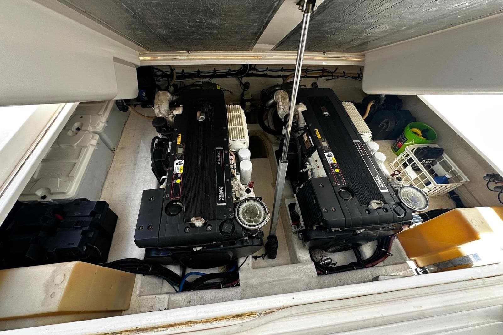 Engine room of 2012 Riviera 43 Flybridge with twin diesel engines.