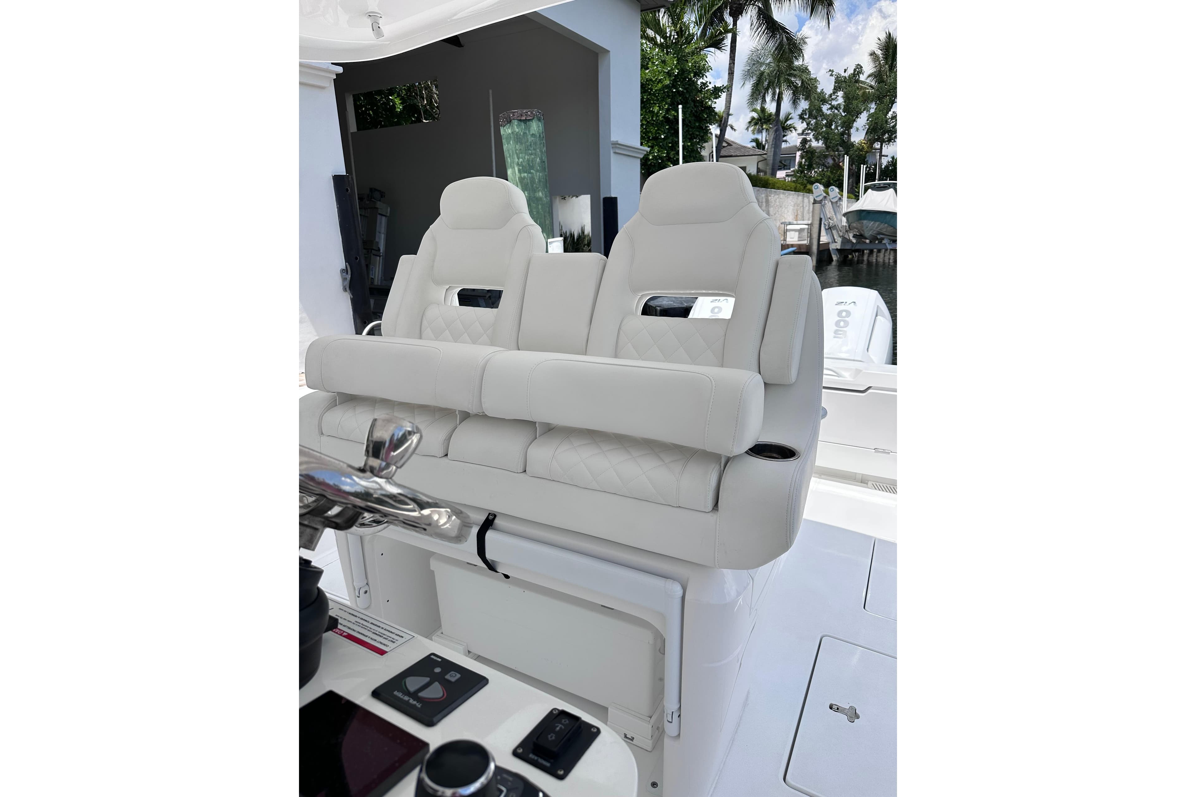 Luxurious seating on 2024 Intrepid 41 Valor boat, featuring plush white upholstery and modern design.