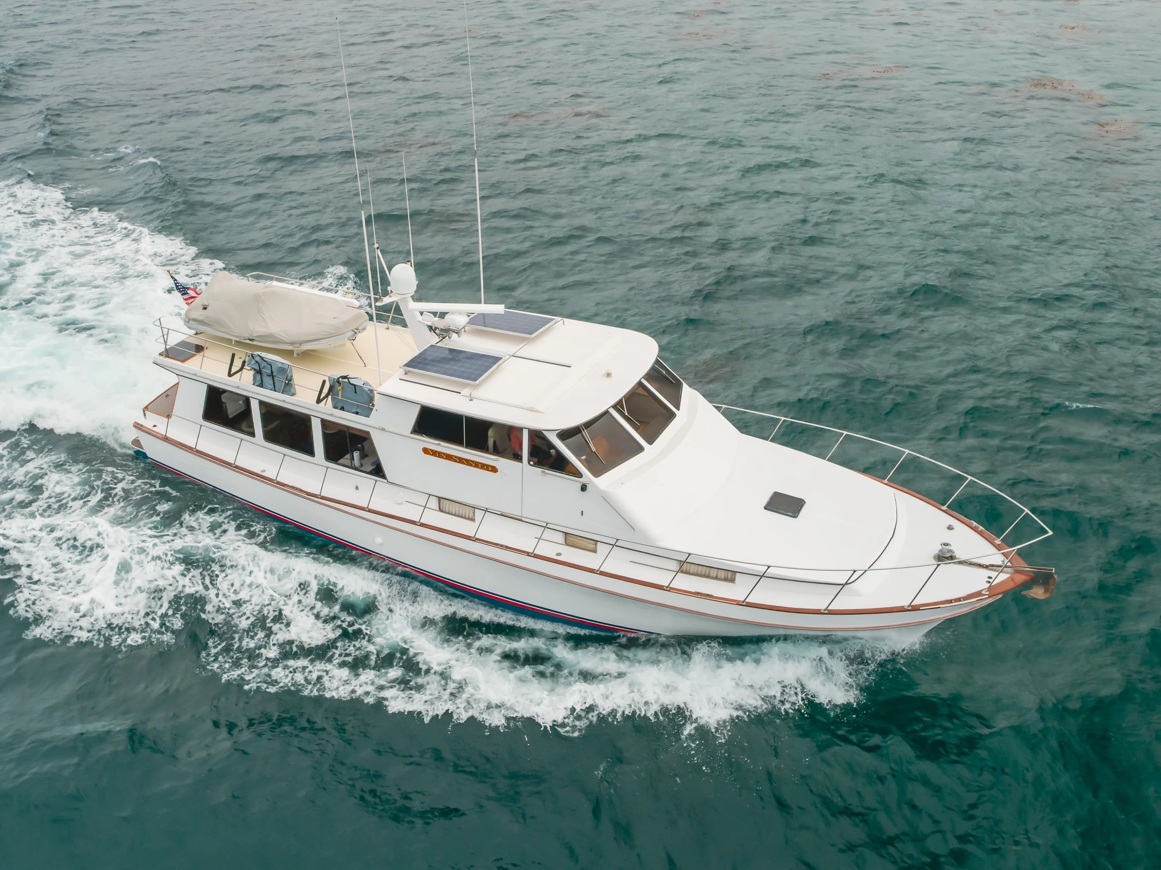1984 Vic Franck Pilot House yacht cruising on open sea.