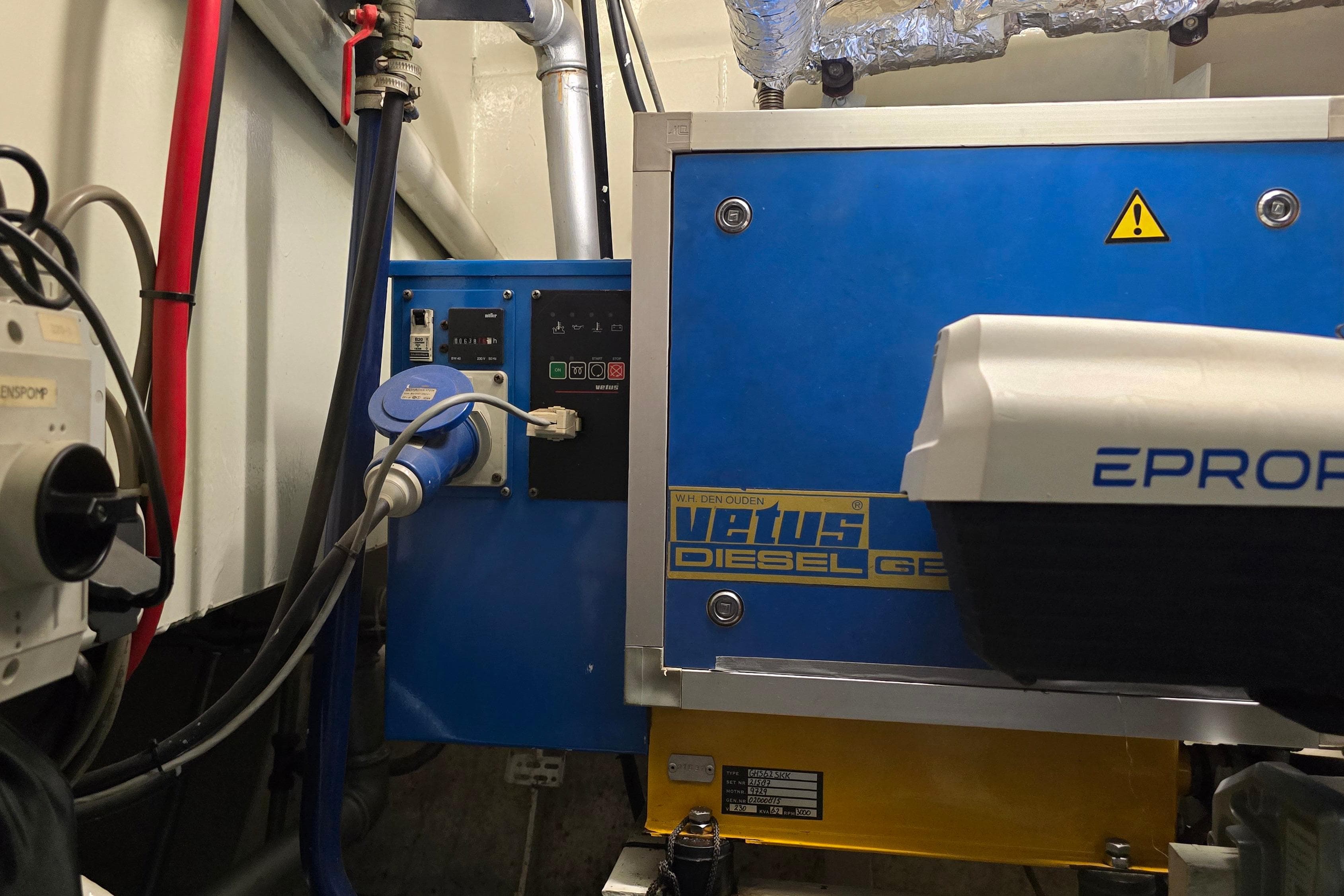 Engine room of a 2002 Colin Archer Bronsveen 14.70 with Vetus diesel generator.