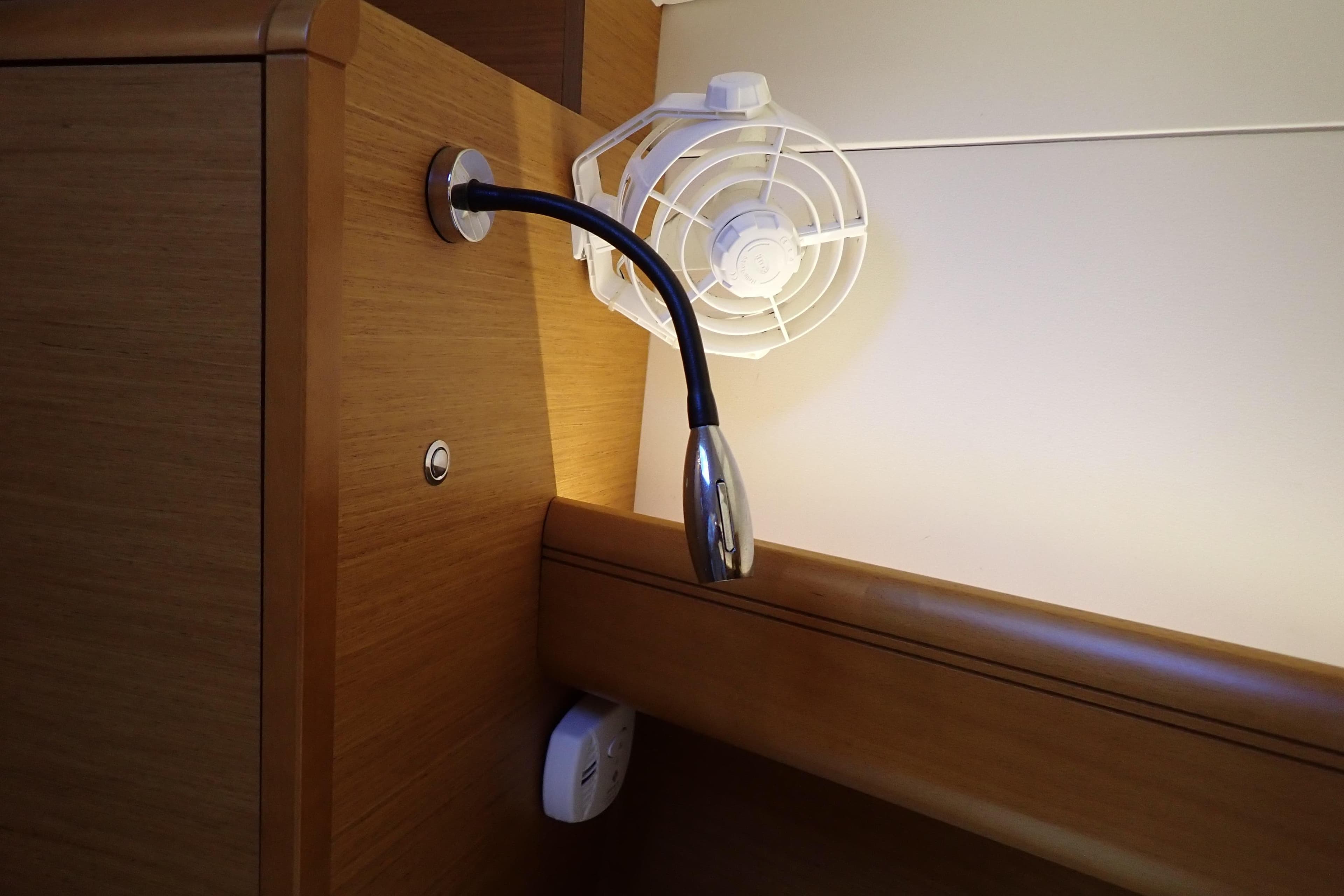 Interior of 2018 Jeanneau Sun Odyssey 389 with reading light and fan.