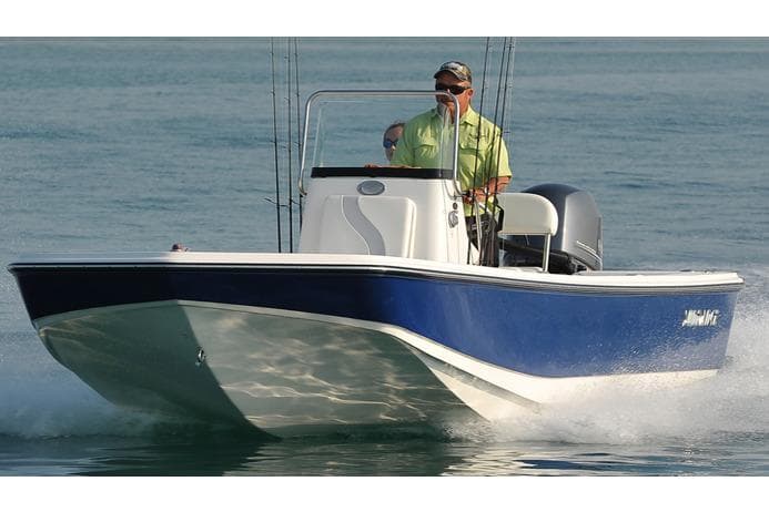 Manufacturer Provided Image: 2025 Sundance DX20 boat cruising on water, featuring a sleek blue and white design.