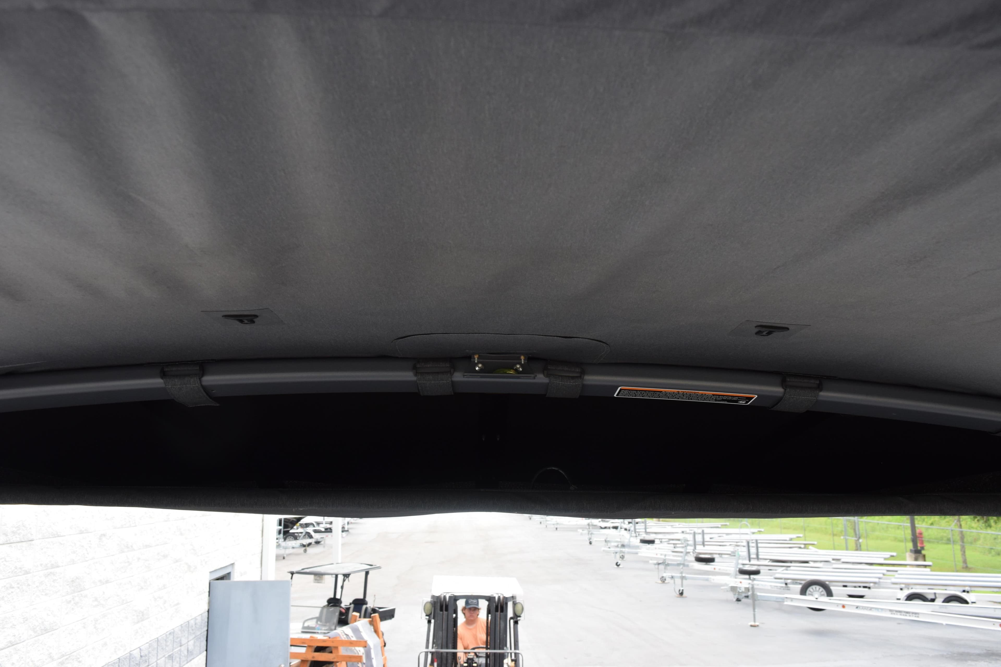 Interior view of 2025 Sea-Doo Switch Fish 18 canopy, showcasing structural details.