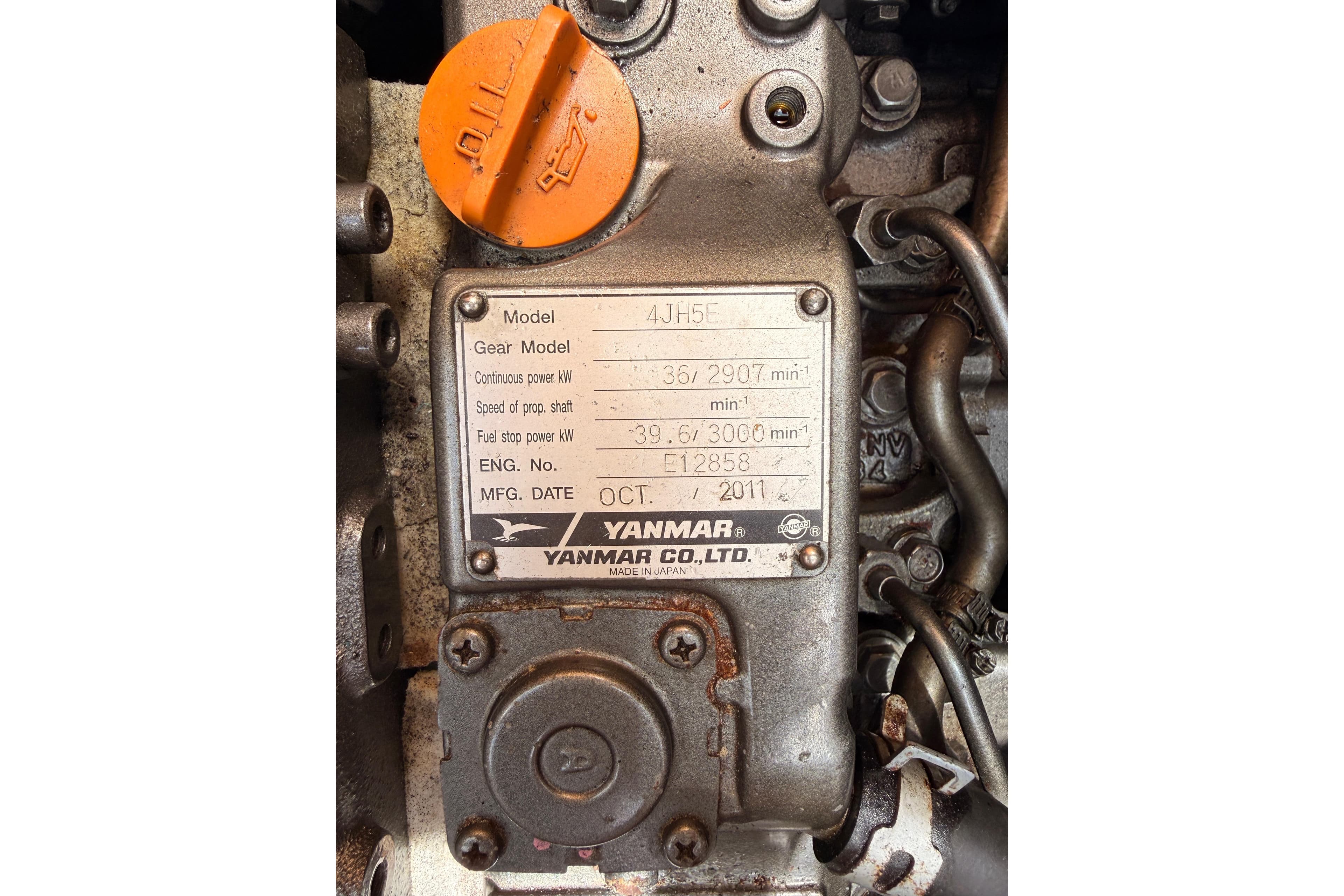 Yanmar engine model 4JH5E with specifications plate, manufactured October 2011.