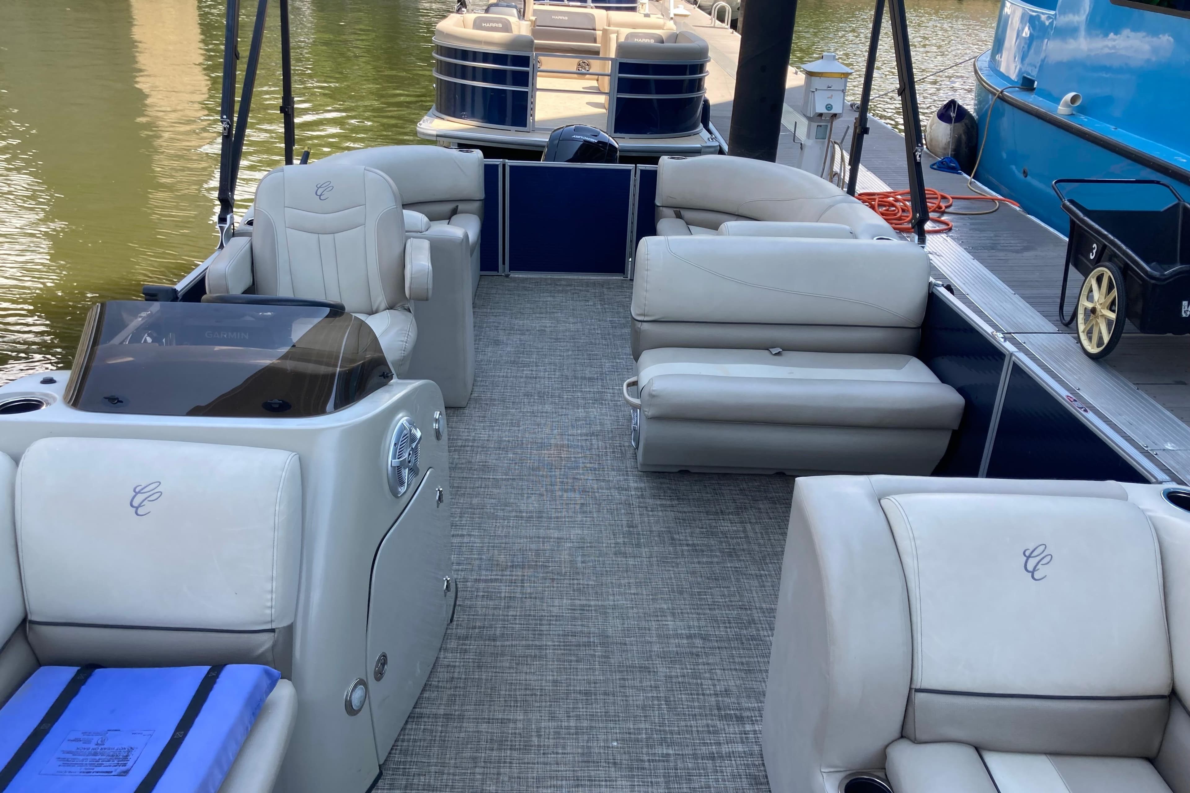 2023 Cypress Cay Seabreeze 232 pontoon boat with luxurious seating and modern design.