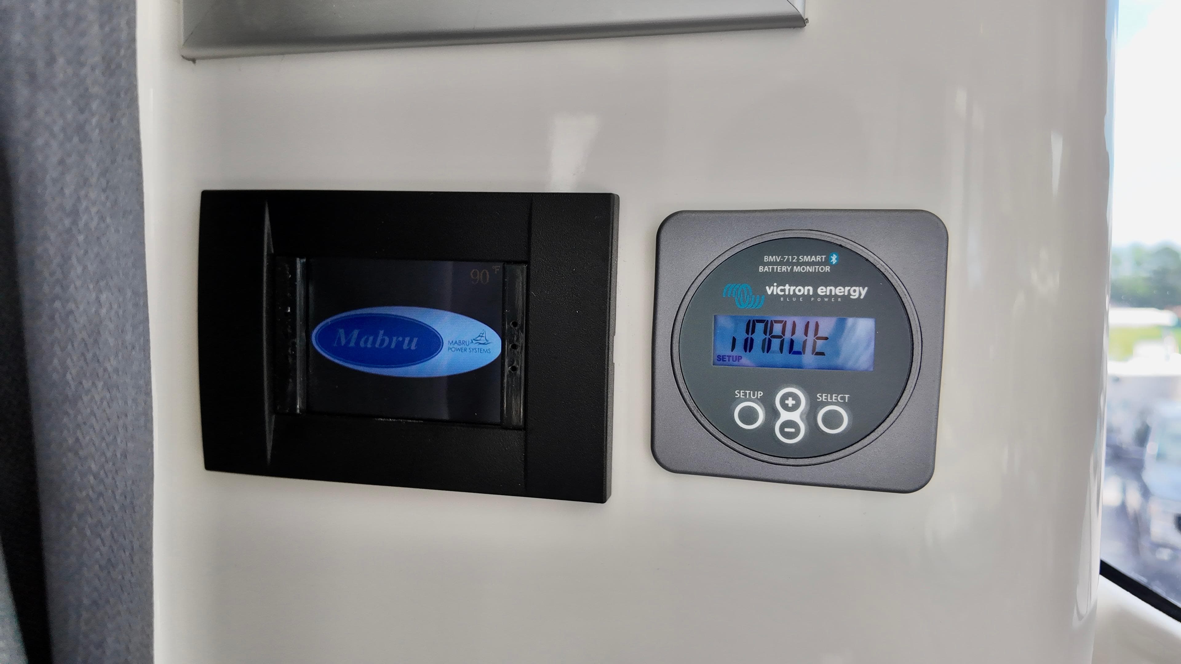 Control panel of 2025 Bayliner Trophy 29 Explorer with Mabru and Victron Energy displays.