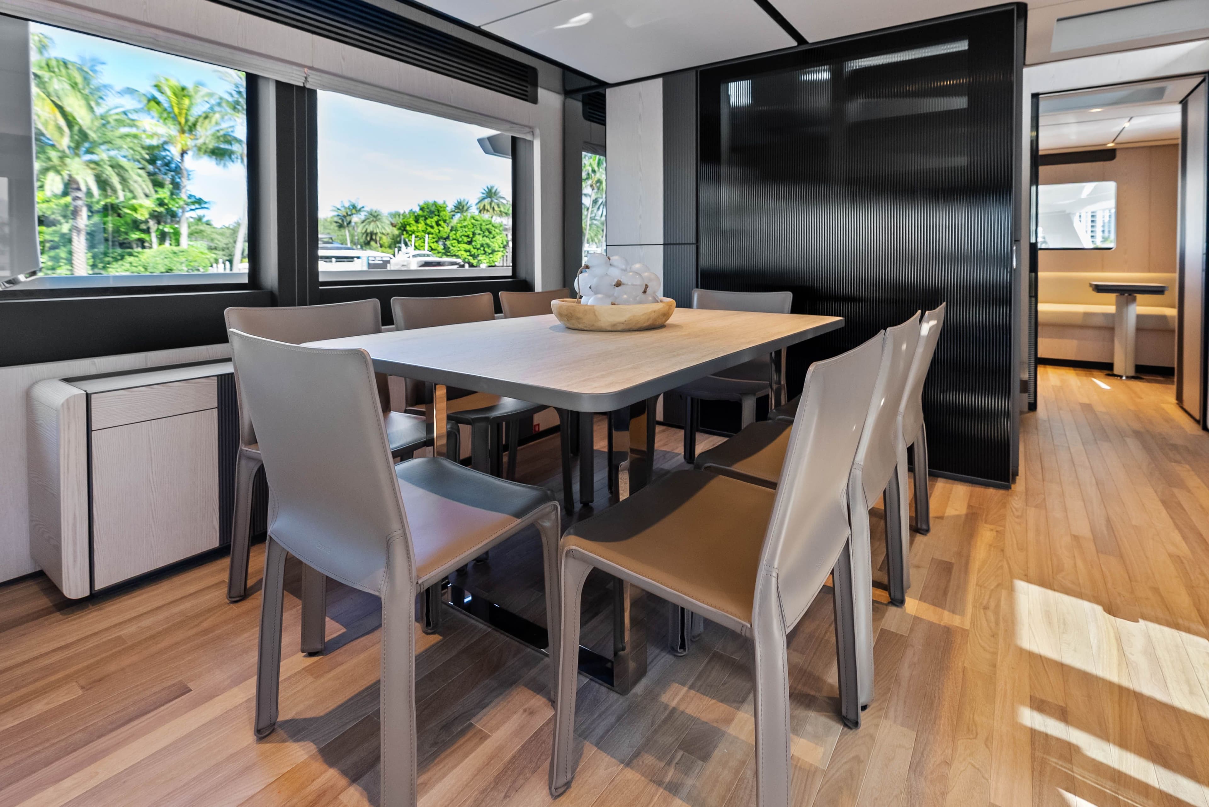 Interior of Ferretti Yachts Infynito 80, dining area with modern design.