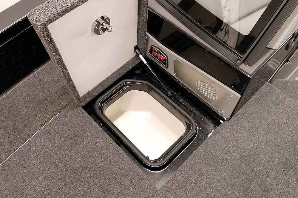 2026 Ranger 622FS Pro boat storage compartment with open hatch and carpeted interior.