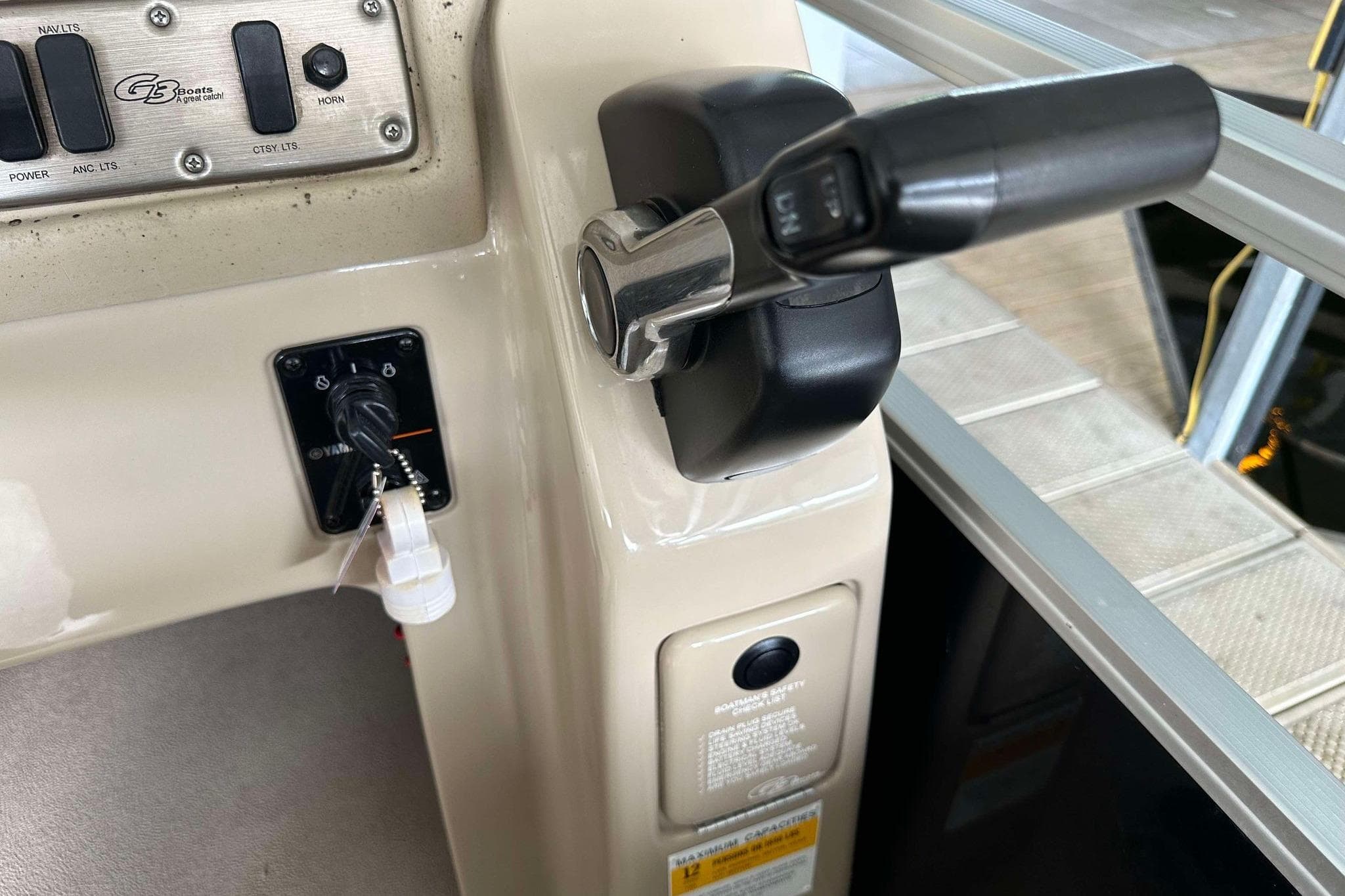 2013 SunCatcher V322 RC boat control panel with ignition and throttle lever.