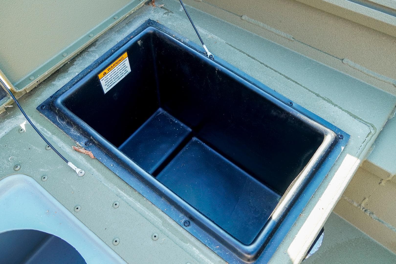 Storage compartment of 2026 G3 Gator Tough 18 CC boat, featuring durable construction.
