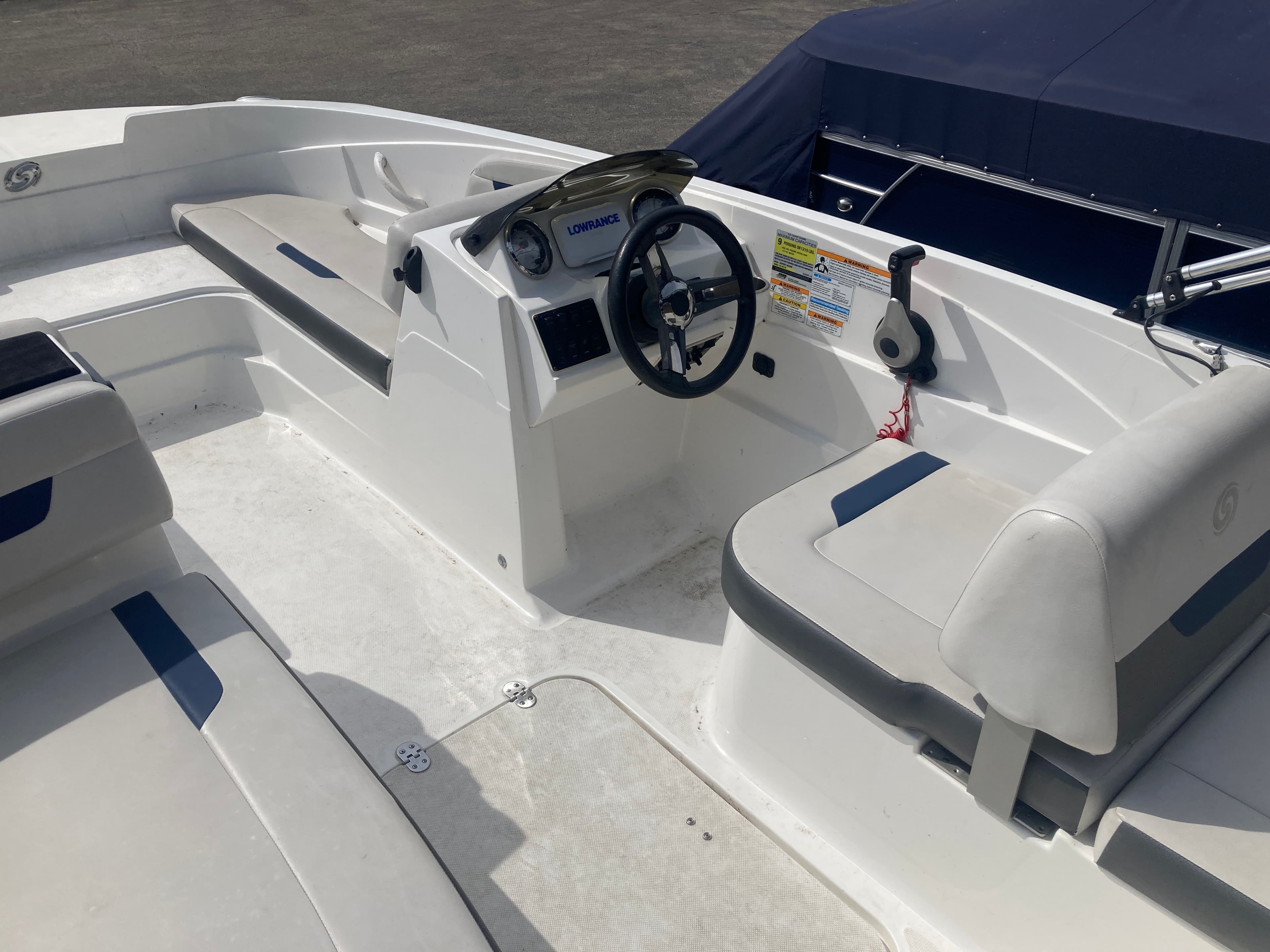 Interior view of 2020 Hurricane SunDeck Sport 185 OB boat.