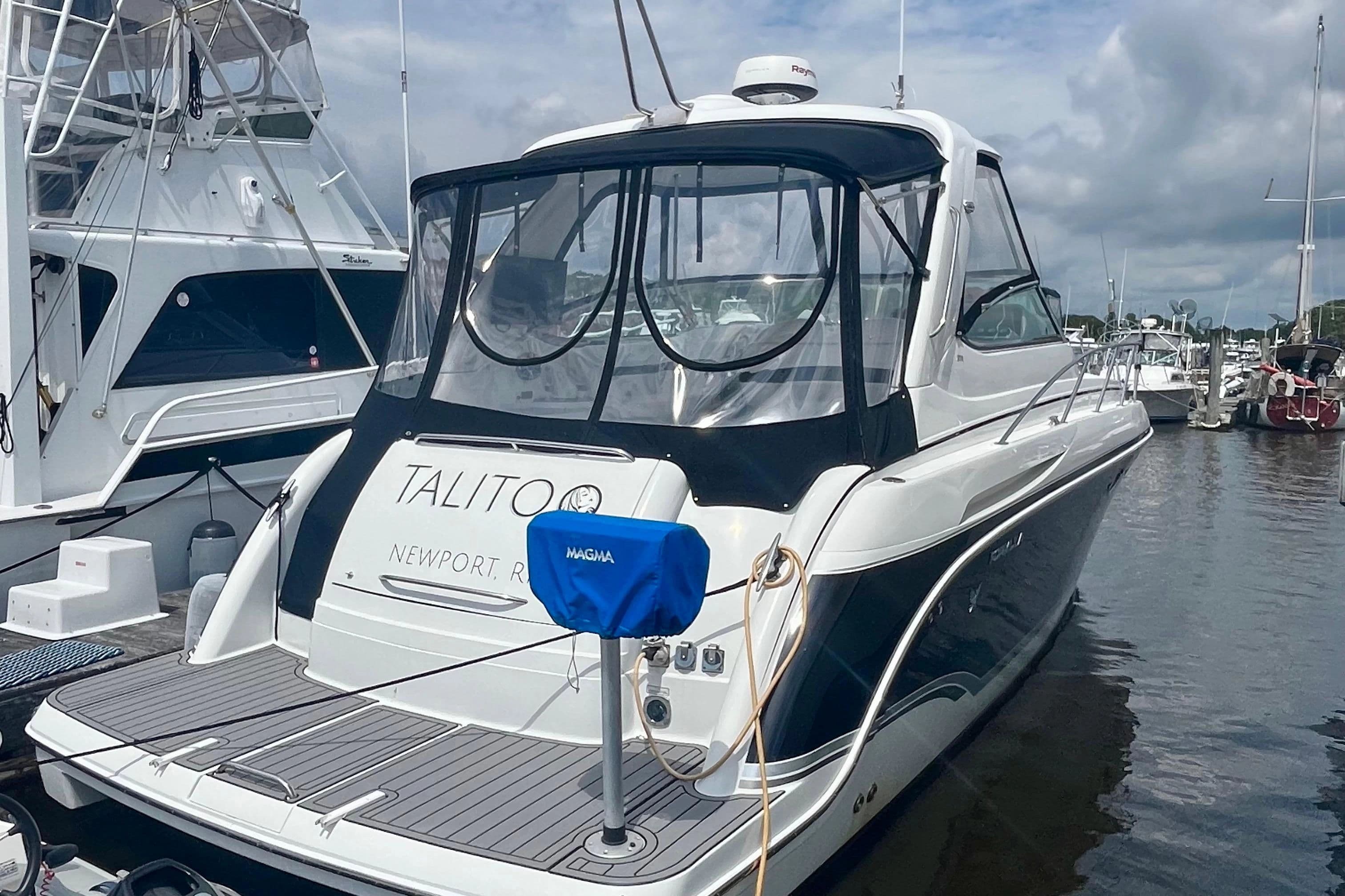 2006 Formula 37 Performance Cruiser docked at marina.