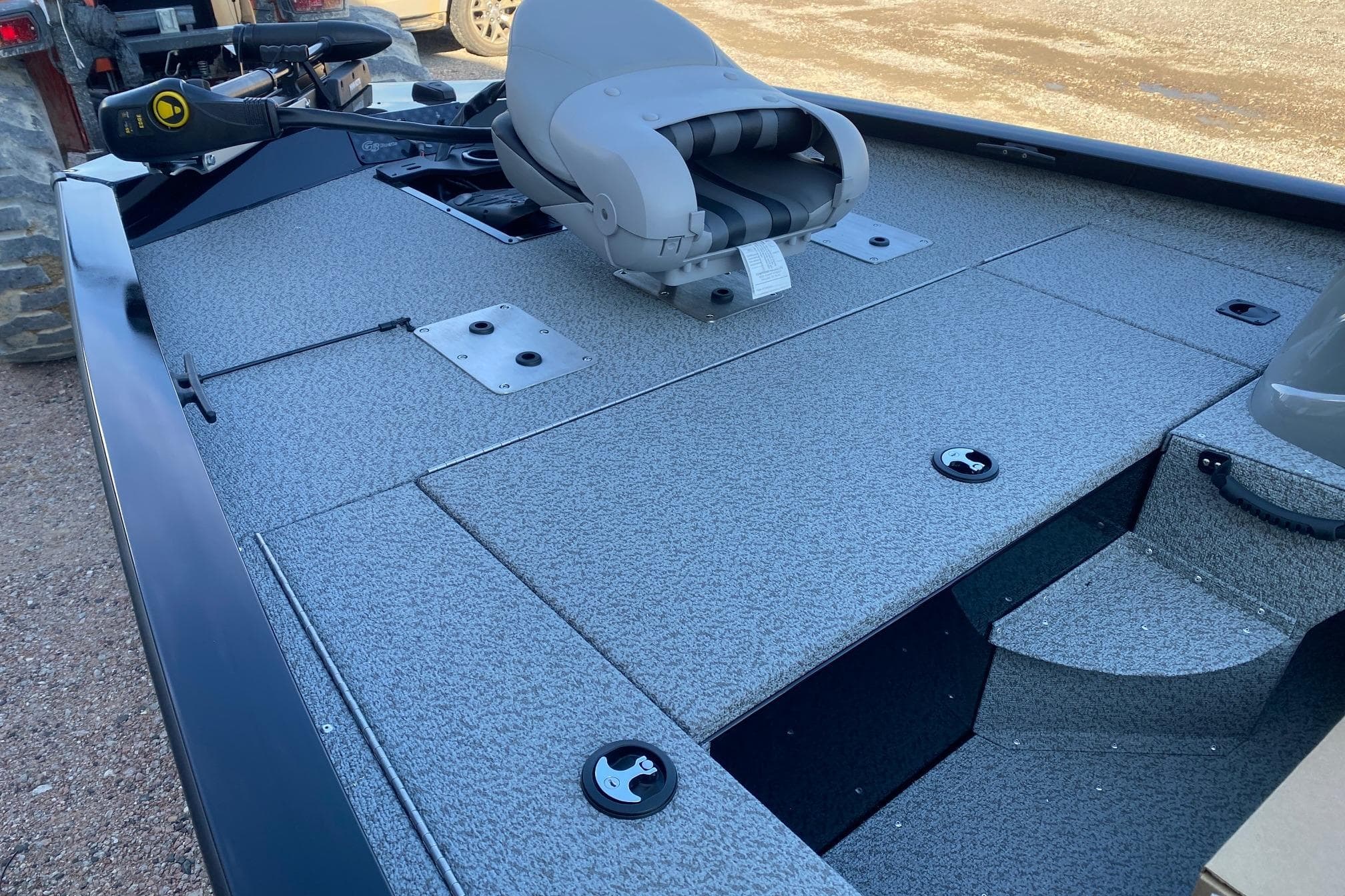 2026 G3 Sportsman 1610 boat interior with seating and storage compartments.