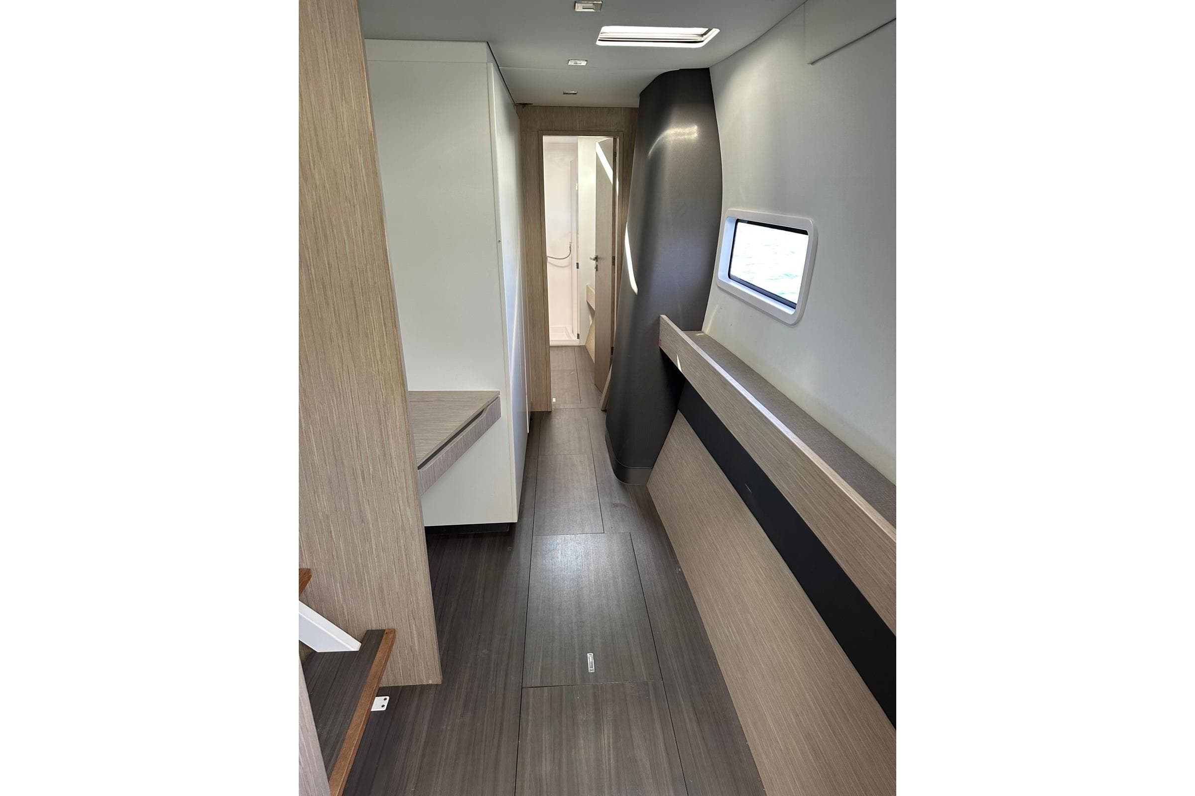 Interior of 2021 Outremer 55 yacht, featuring modern design and wood accents.