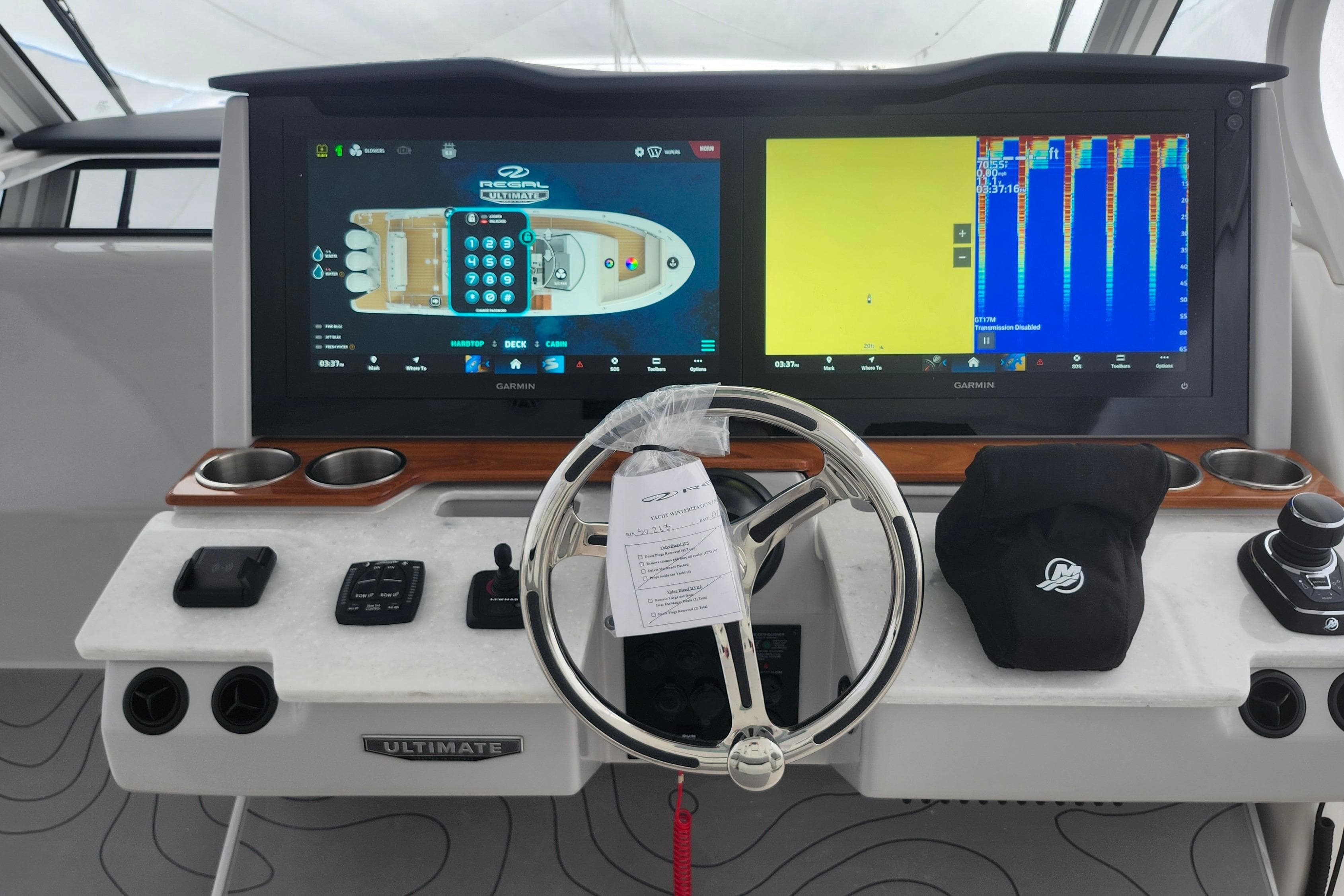 2026 Regal 38 SAV boat dashboard with advanced Garmin navigation displays and controls.