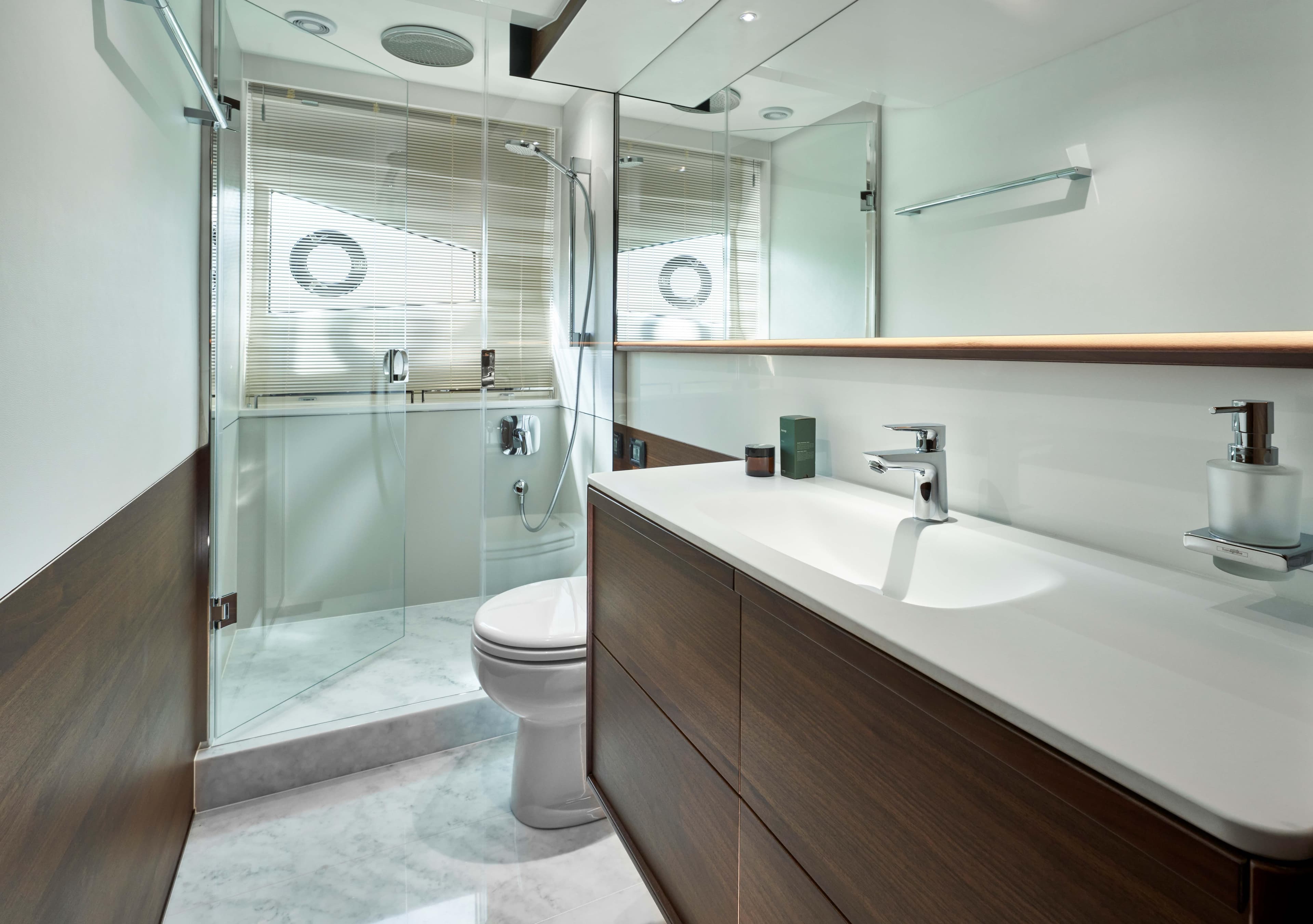 Luxurious bathroom in 2025 Princess F65 yacht with modern fixtures and elegant design.