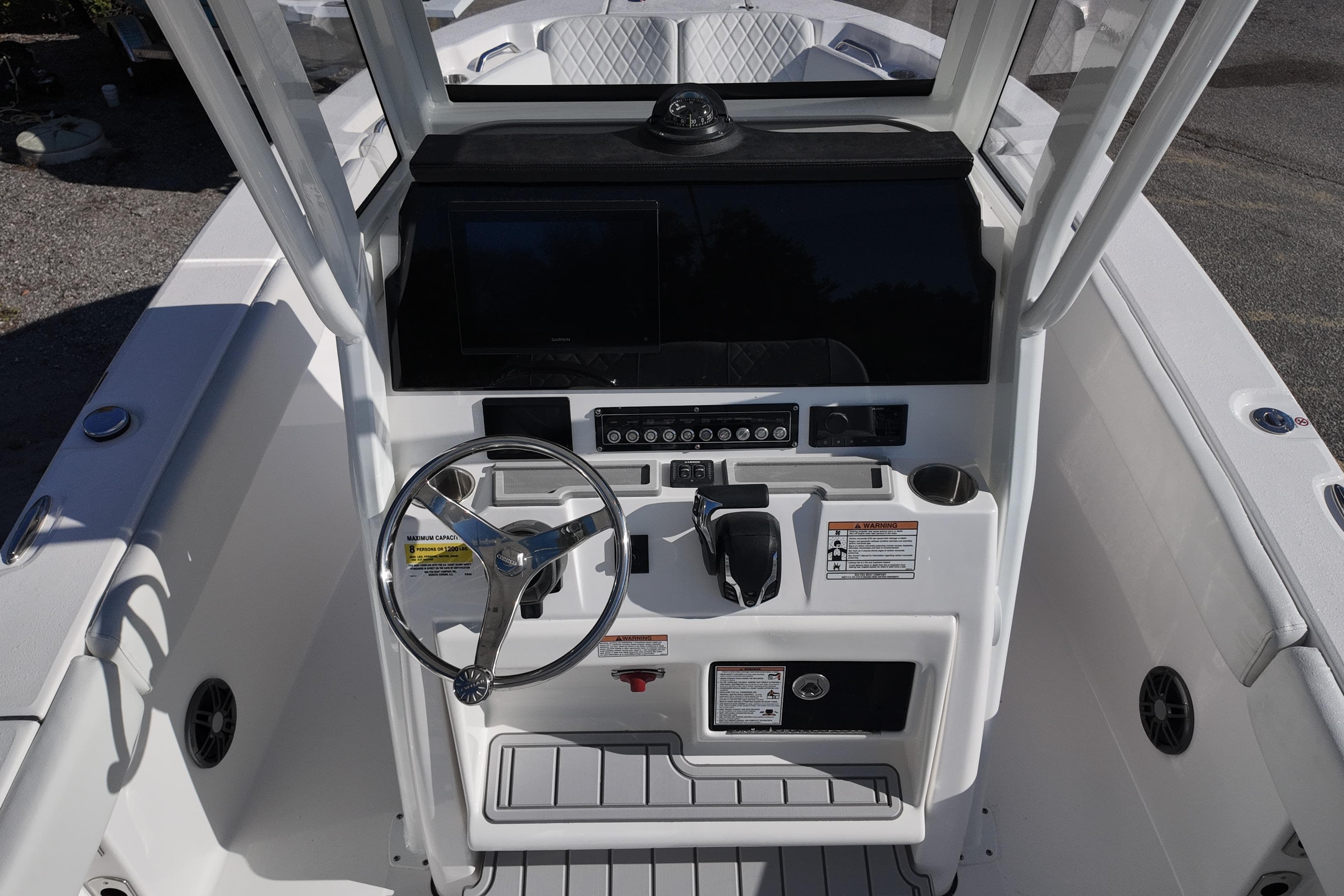 2026 Sea Fox 228 Commander boat console with steering wheel and controls.