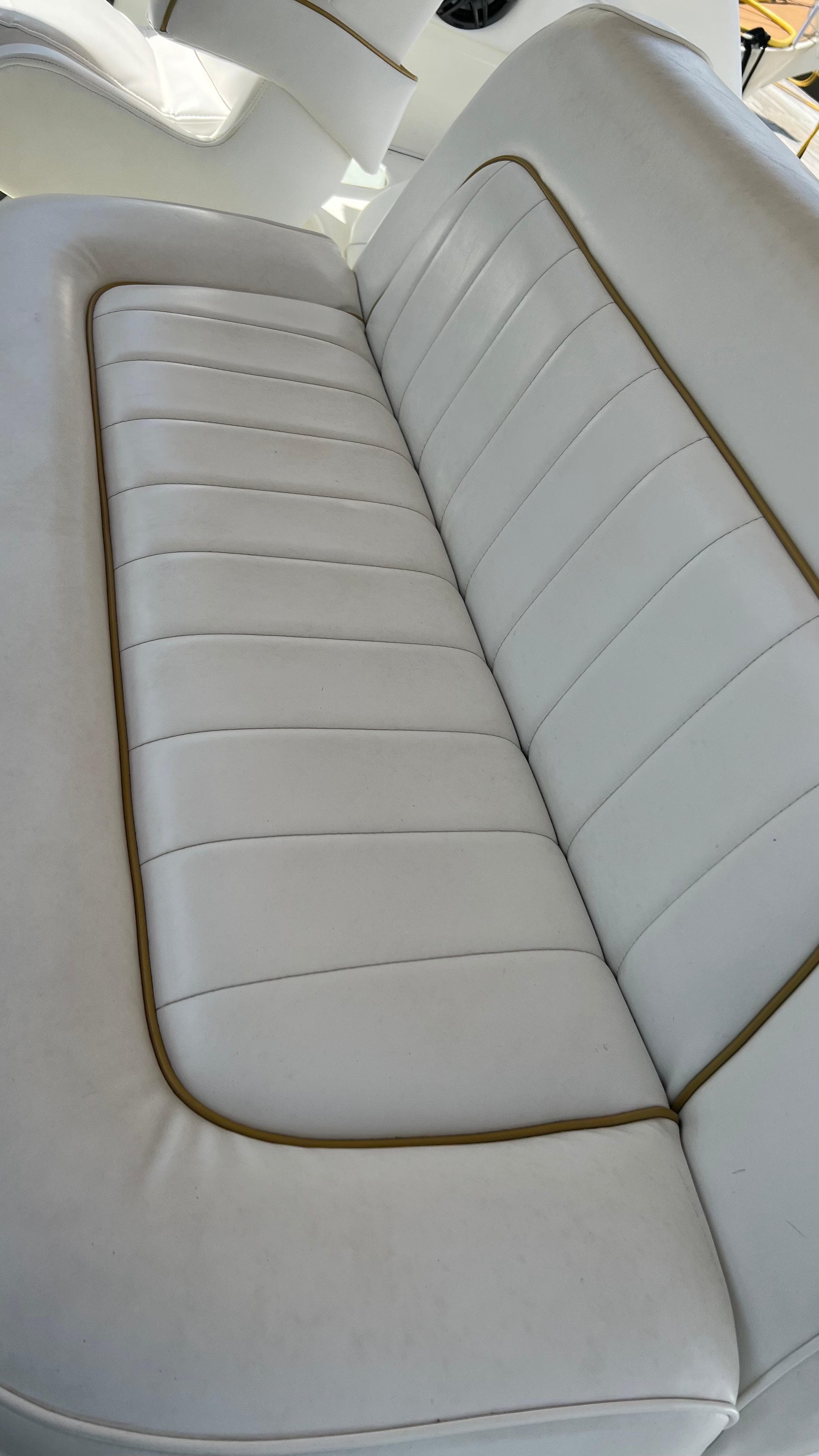 White leather seating on a 1997 Sea Ray 400 boat.