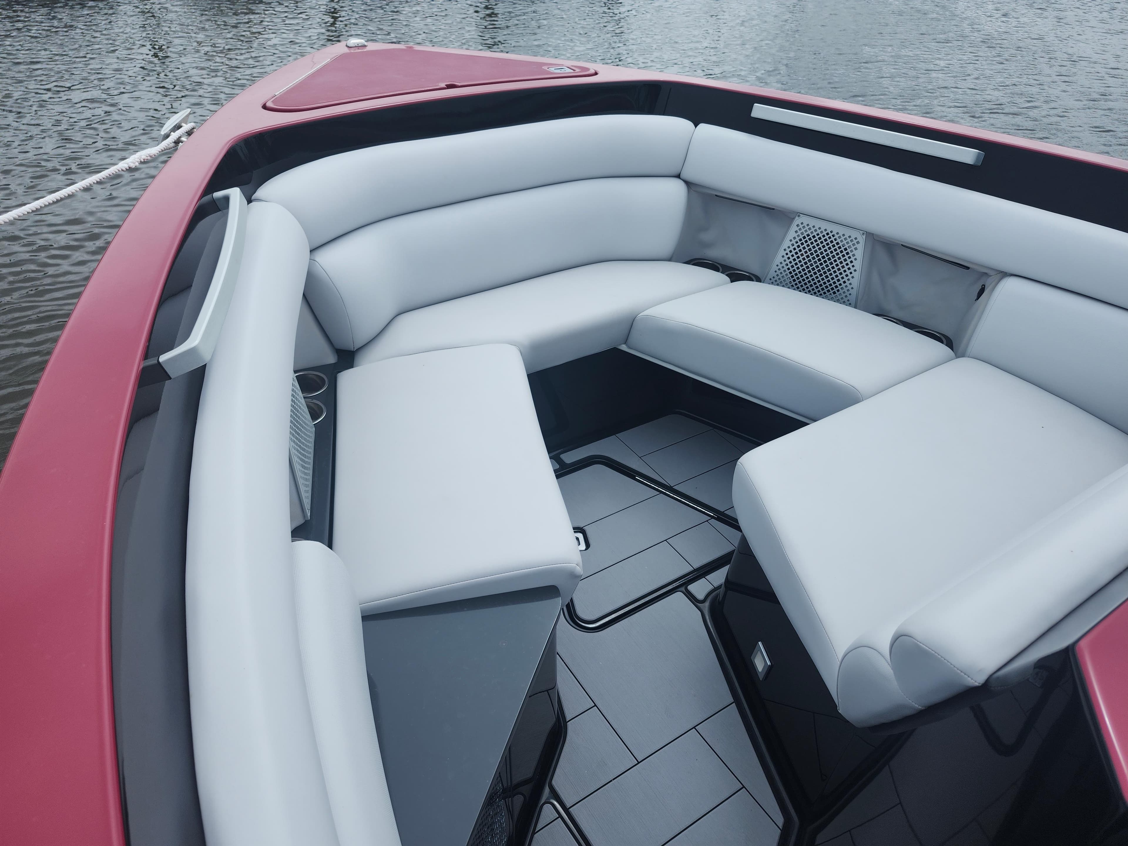 2020 Aviara AV32 I/O boat interior with sleek white seating and modern design.