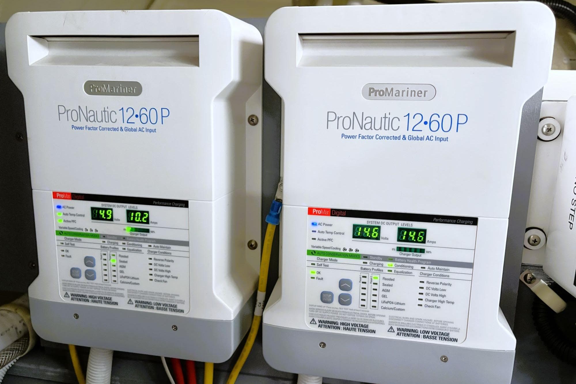 ProMariner ProNautic 12-60P chargers in a 2016 Carver C40 boat, displaying voltage and amperage.