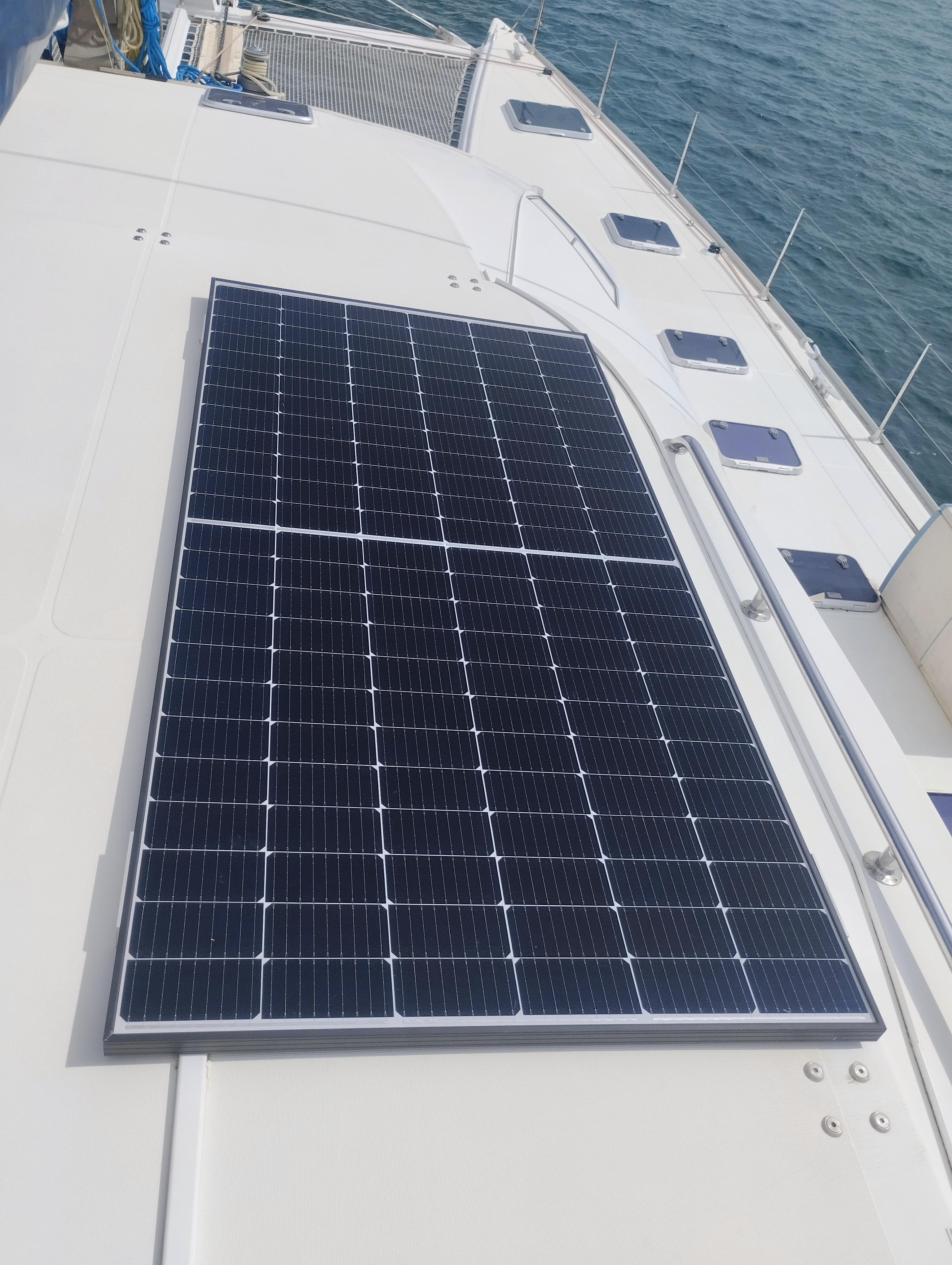 Solar panel on 2004 Lagoon 570 yacht deck, ocean background.