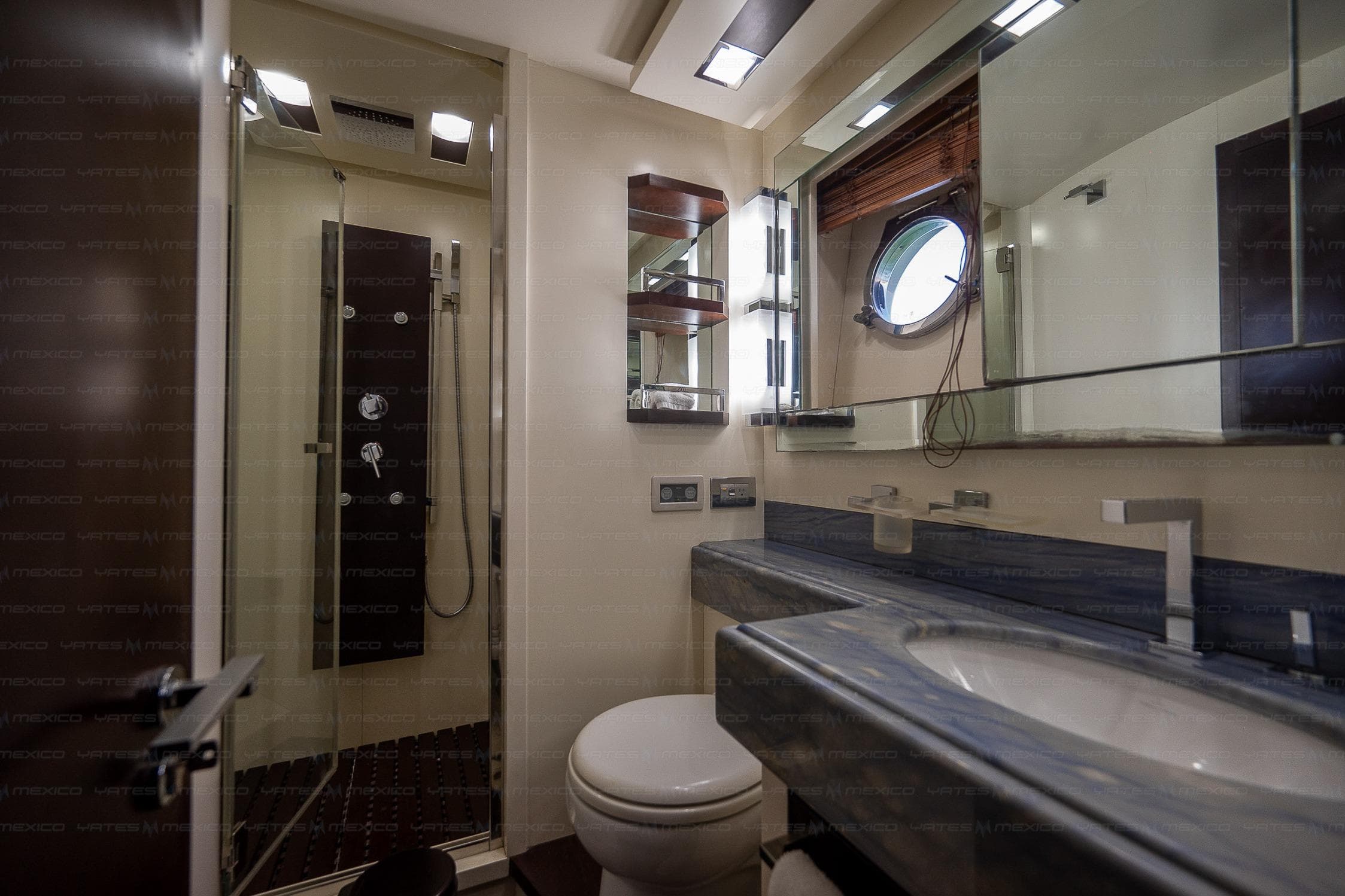 Luxurious bathroom interior on a 2009 Azimut 75 yacht, featuring modern fixtures and a sleek design.