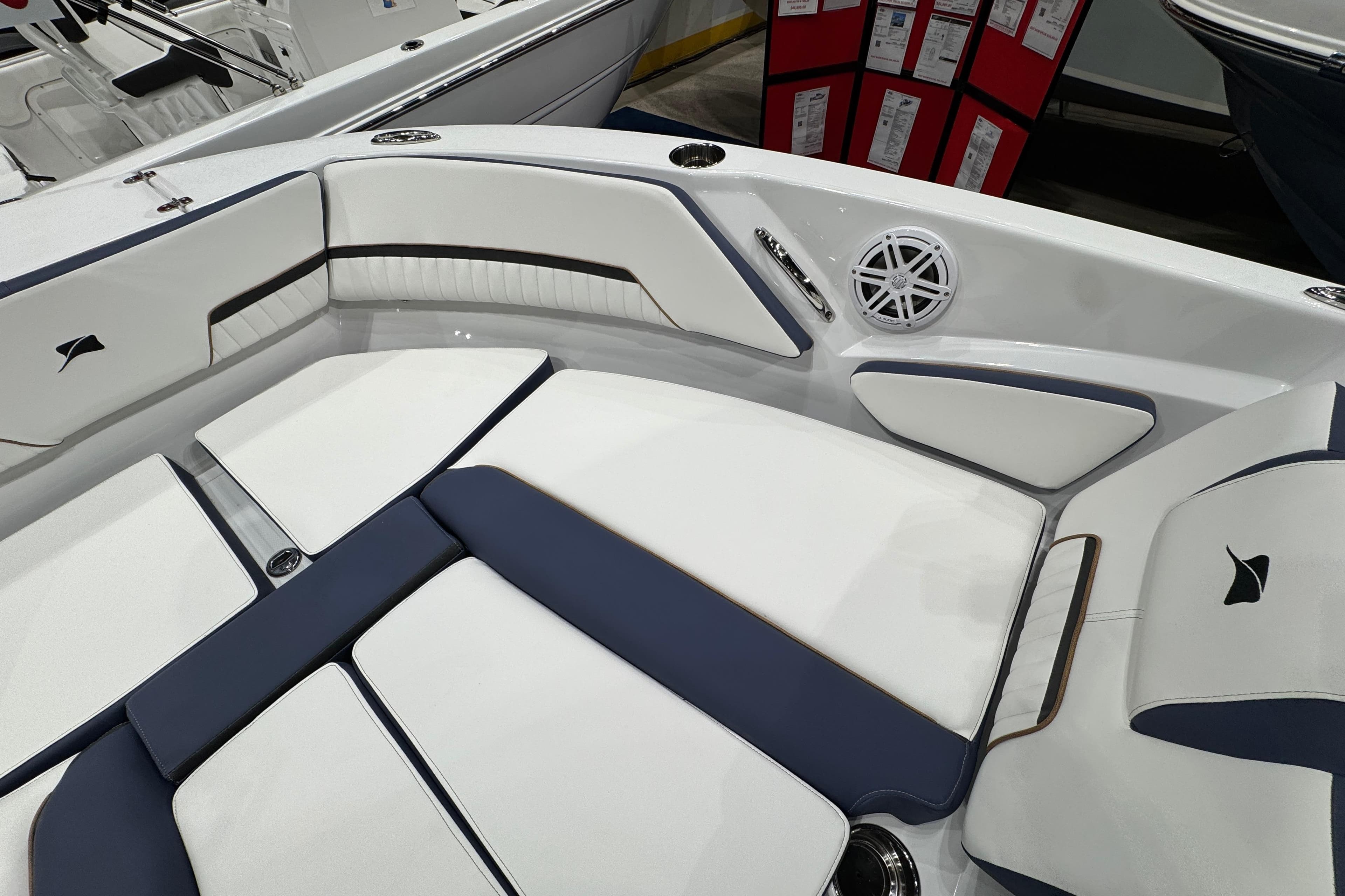 Interior of 2026 Stingray 20 SBX boat with white and navy seating.