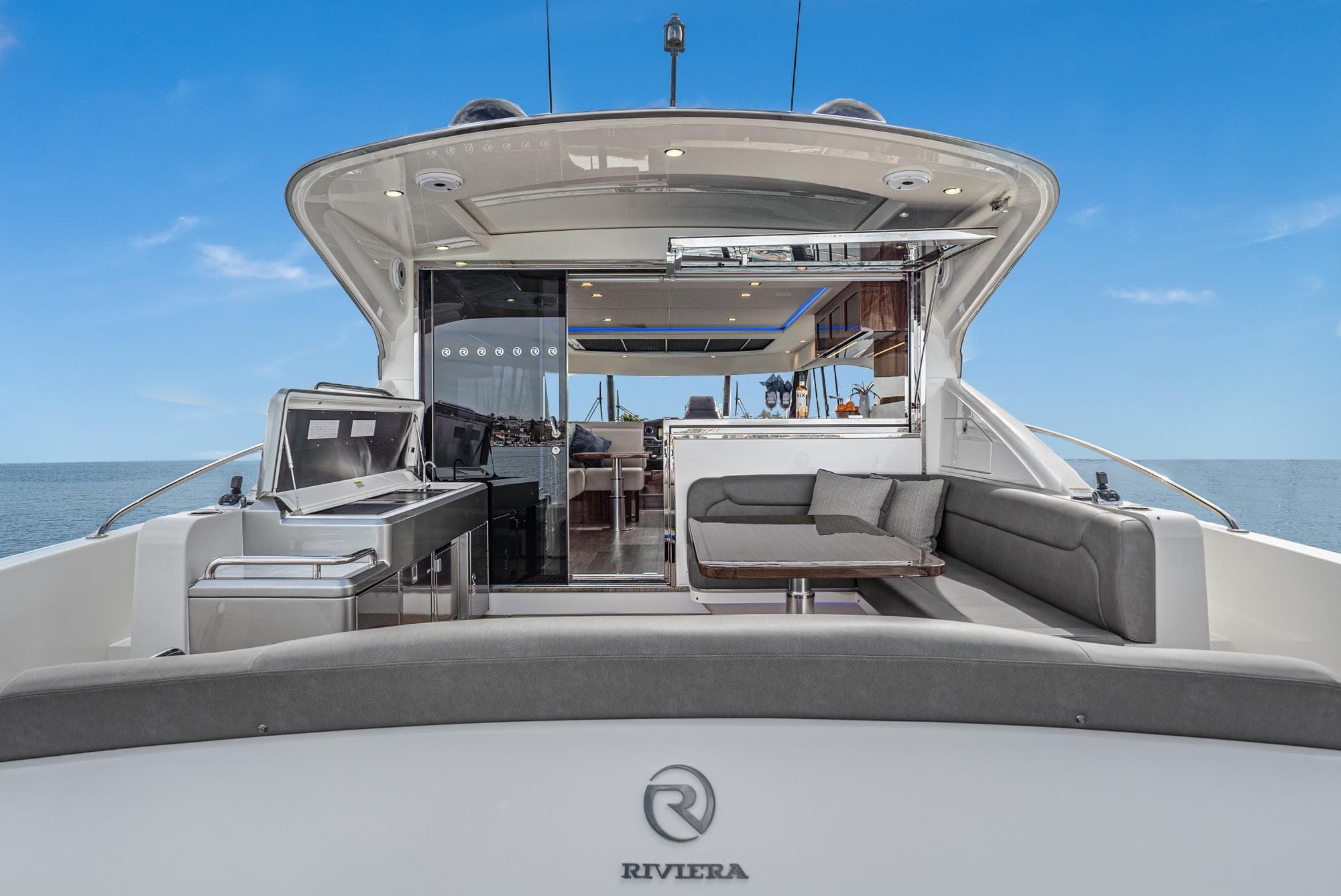 2020 Riviera 5400 Sport Yacht with spacious deck and modern interior design.