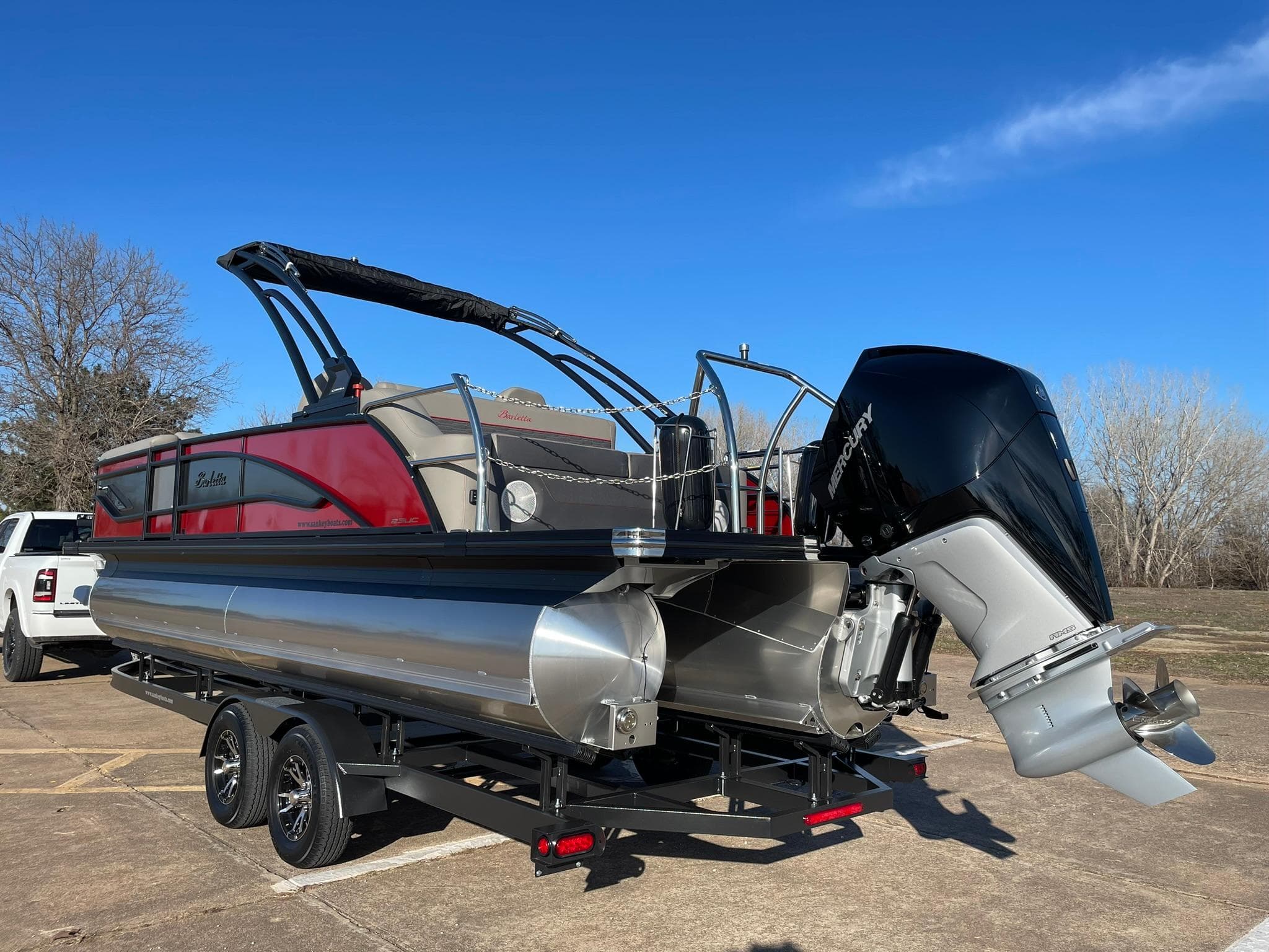 2024 Barletta CORSA 23UCA pontoon boat on a trailer, rear view.