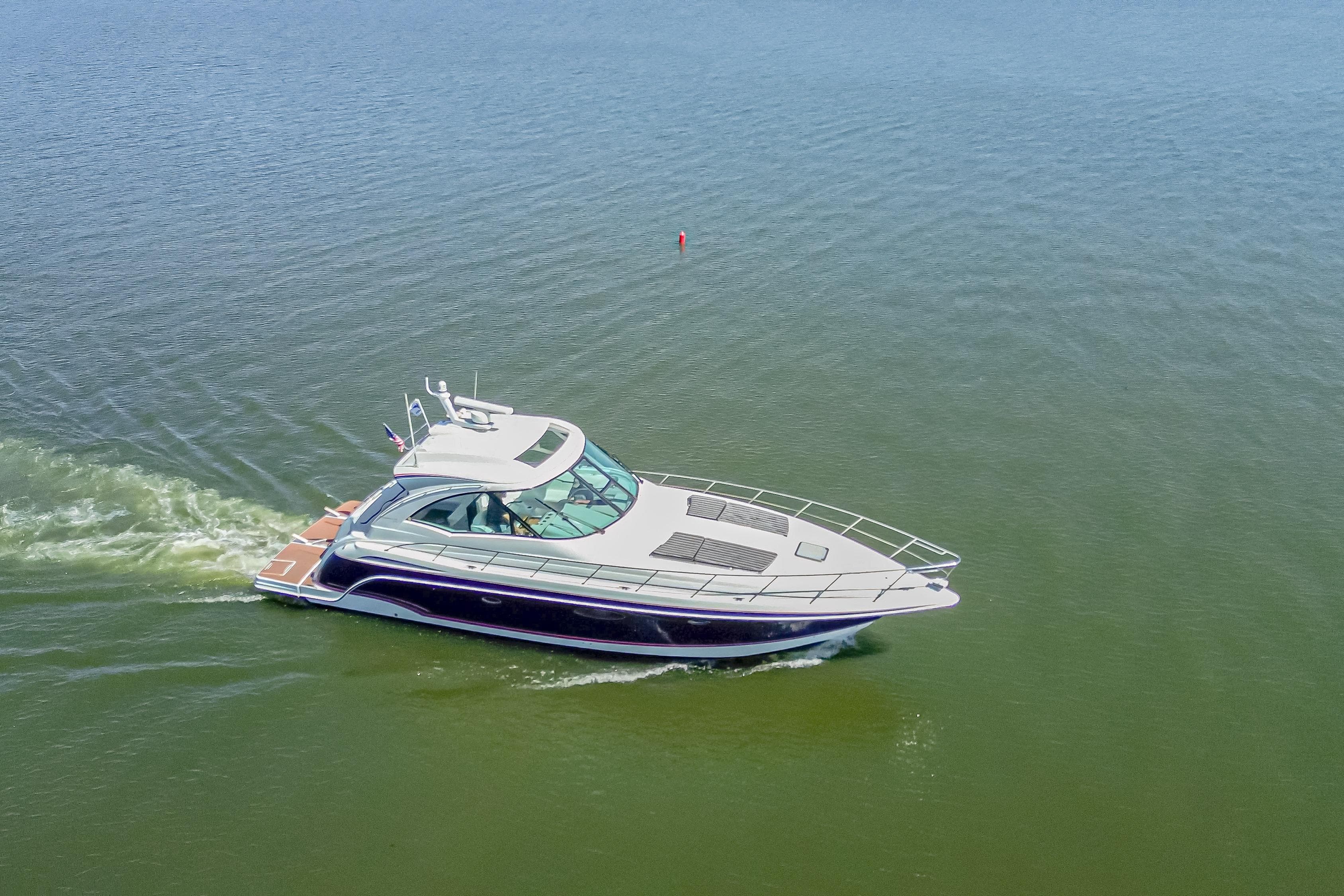 2008 Formula 45 Yacht cruising on open water, aerial view.