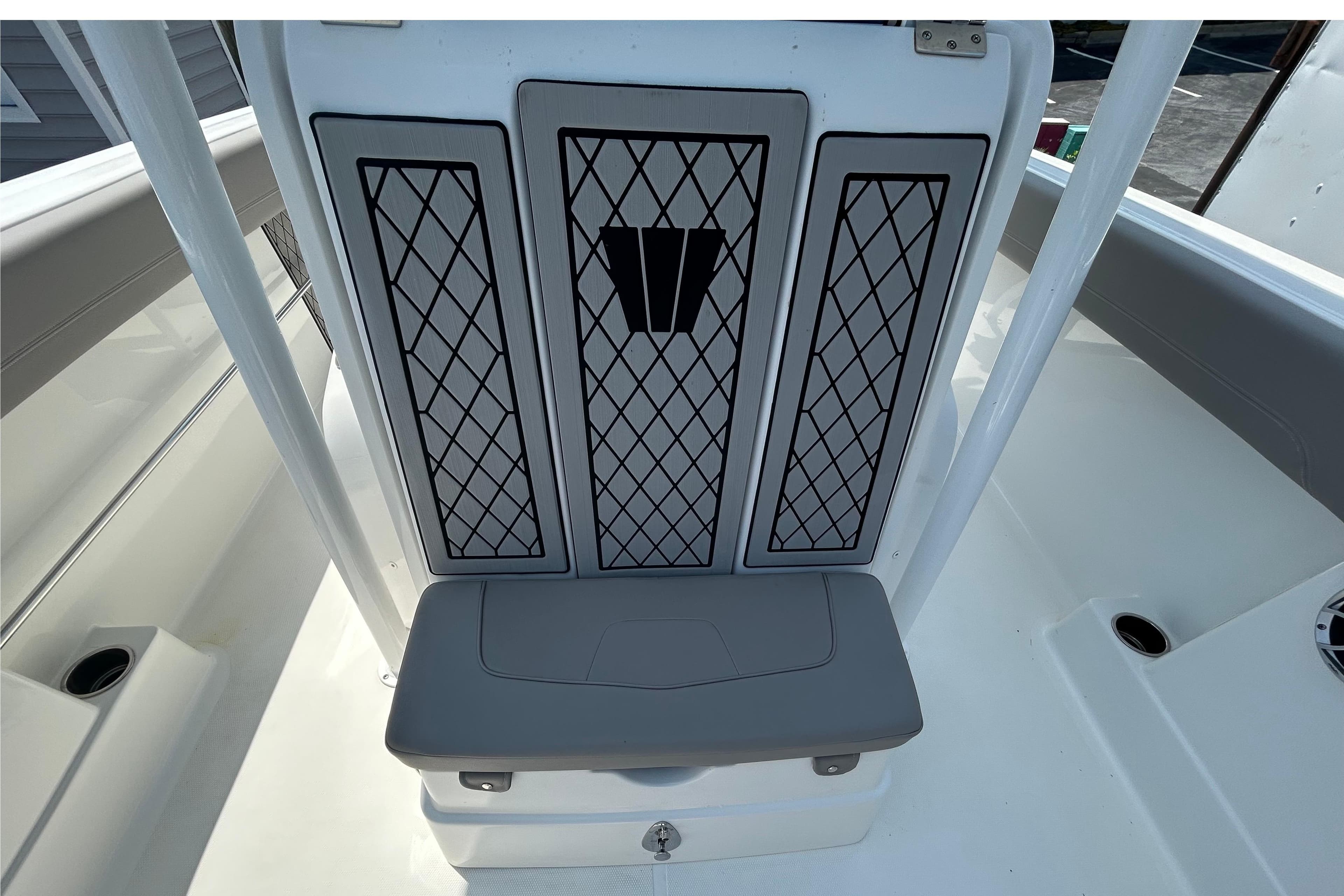 2020 Wellcraft 222 Fisherman boat interior with cushioned seating and storage.