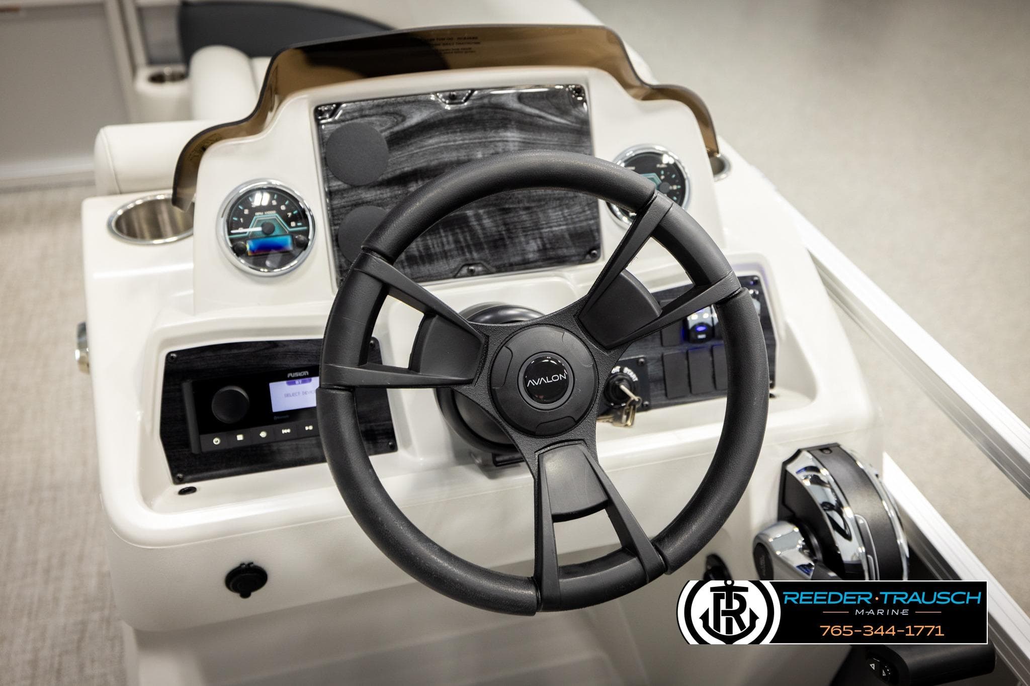 Steering console of 2026 Avalon VLS QL boat with modern controls and gauges.