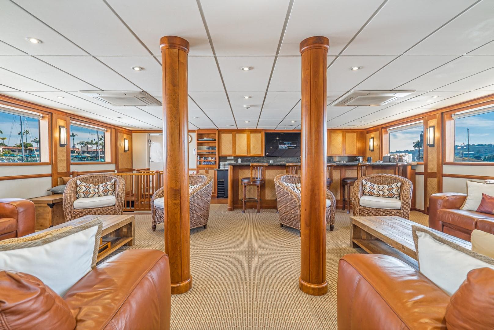 Luxurious interior of 1978 Blount Expedition Vessel with elegant seating and wooden accents.