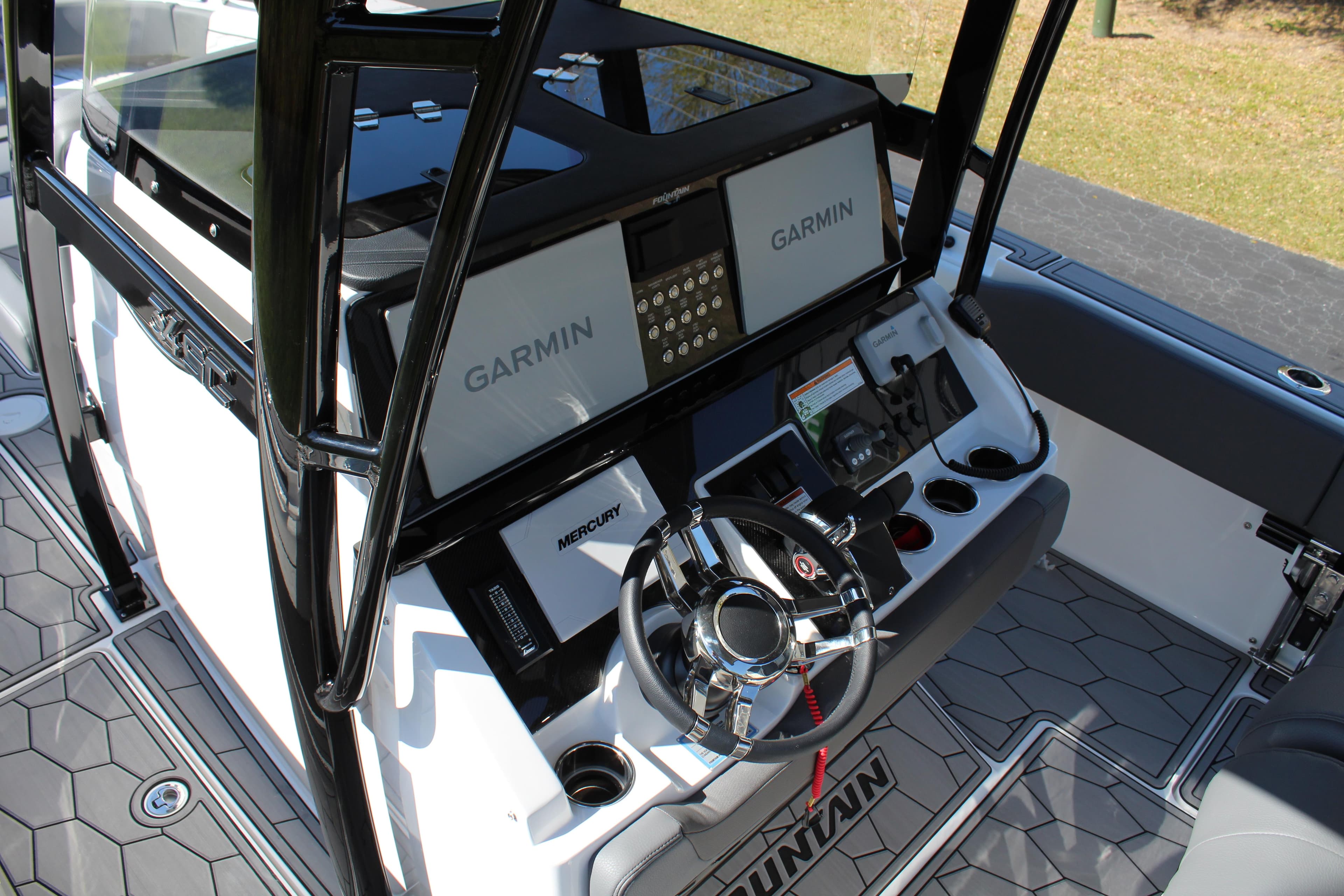 2023 Fountain 34 SC boat dashboard with Garmin navigation and Mercury controls.
