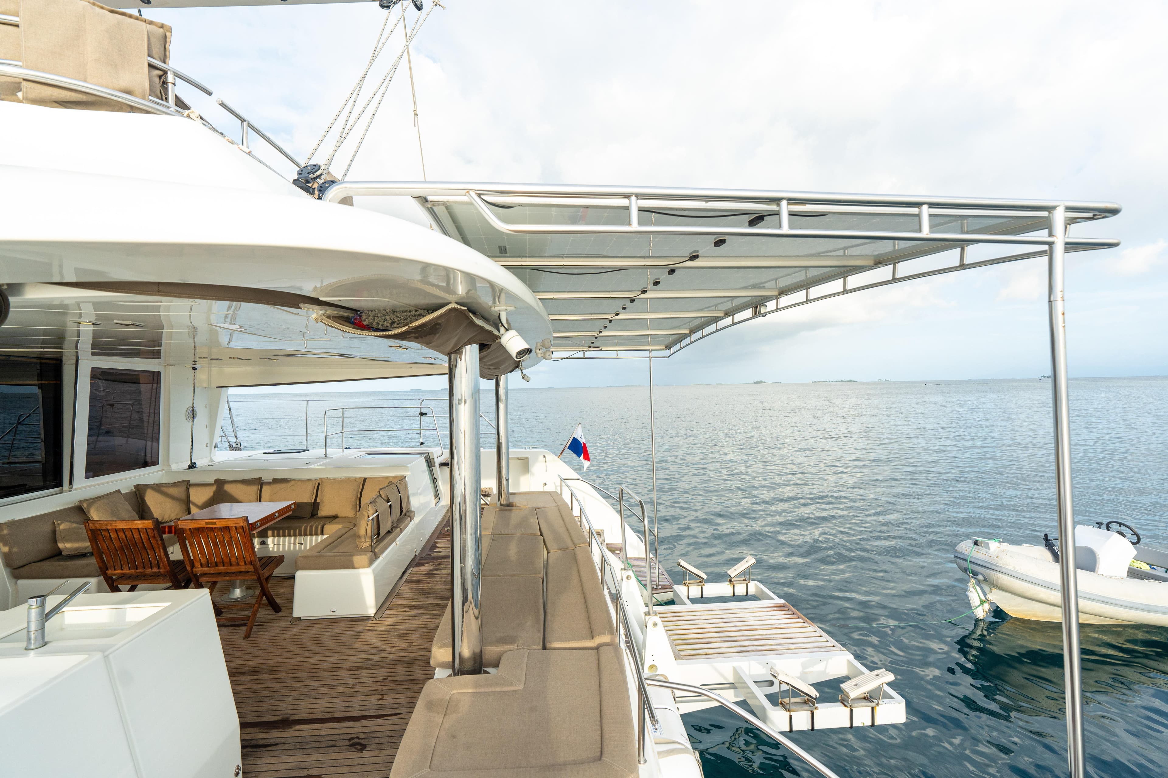 Luxurious 2011 Lagoon 560 yacht with spacious deck and ocean view.