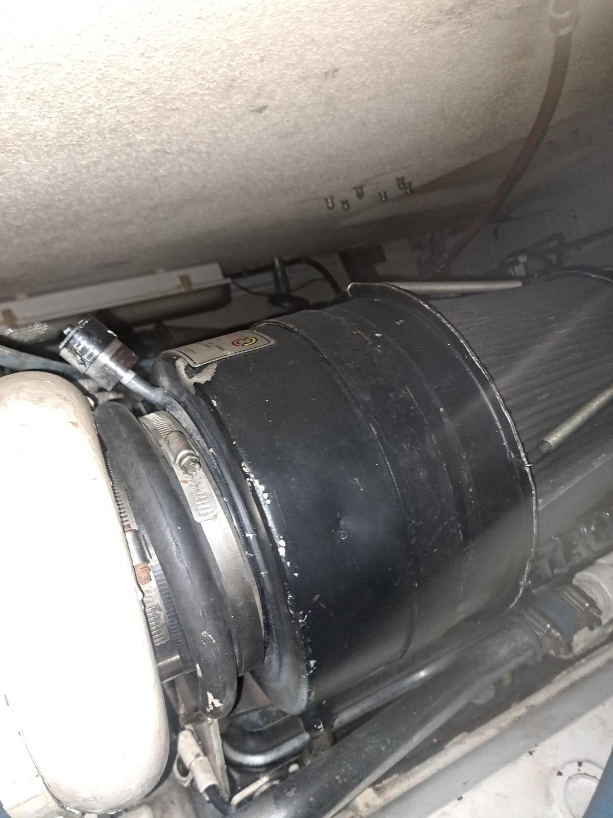 Engine component of a 1999 Hatteras 50 Convertible yacht.