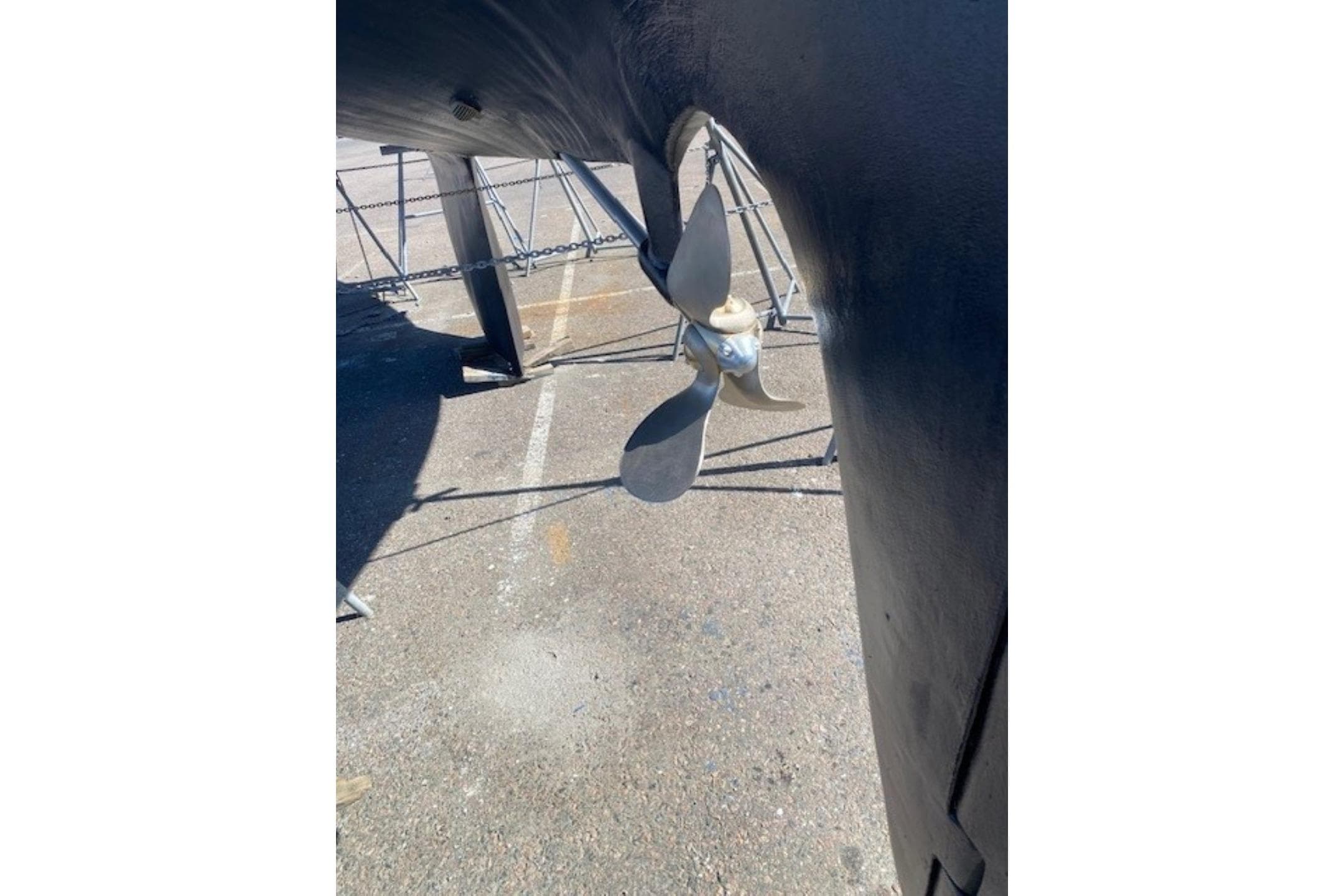 Propeller of a 1976 Nautor Swan 38 sailboat on dry dock.