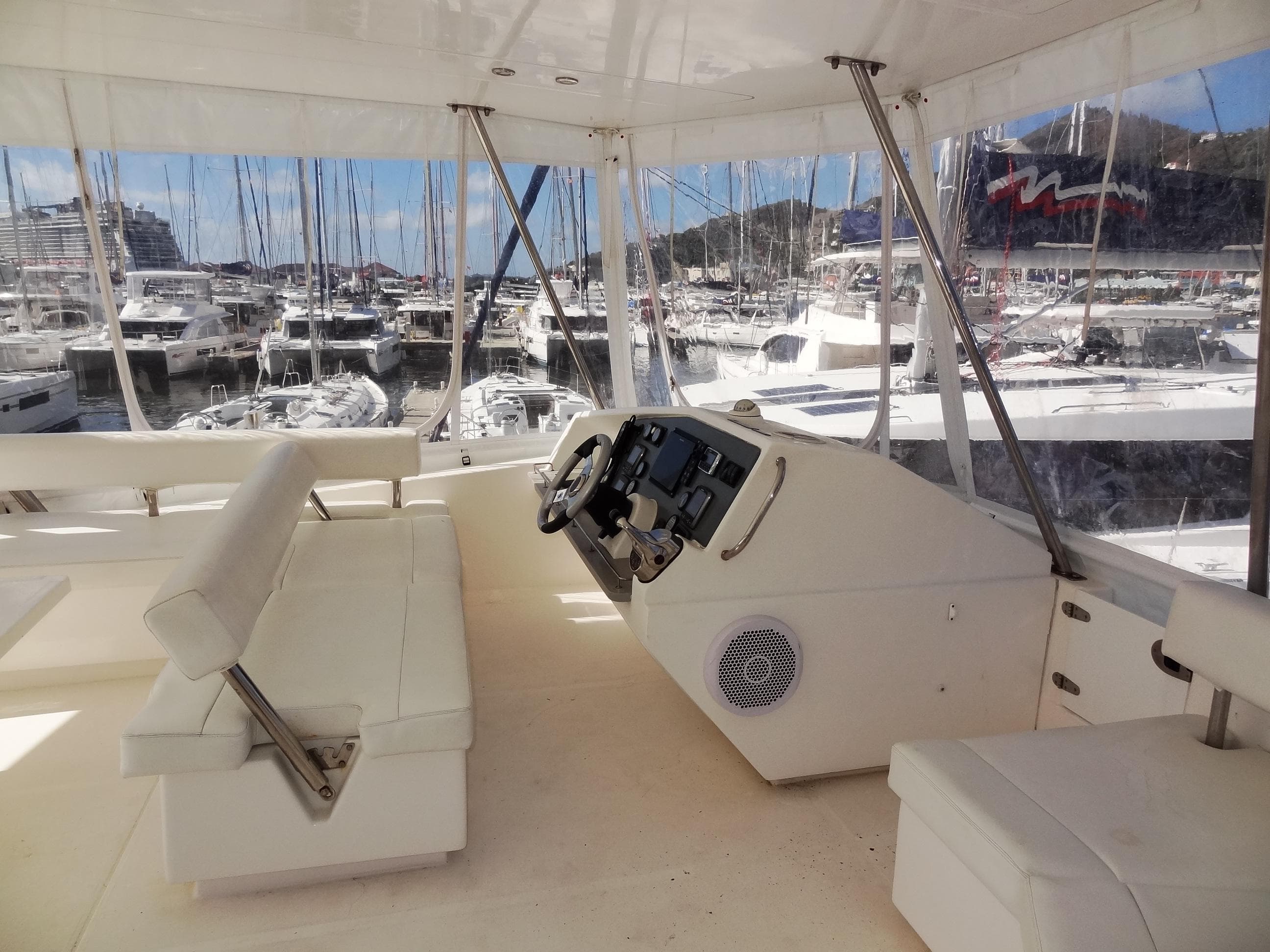2017 Leopard 51 Powercat helm station with marina view.